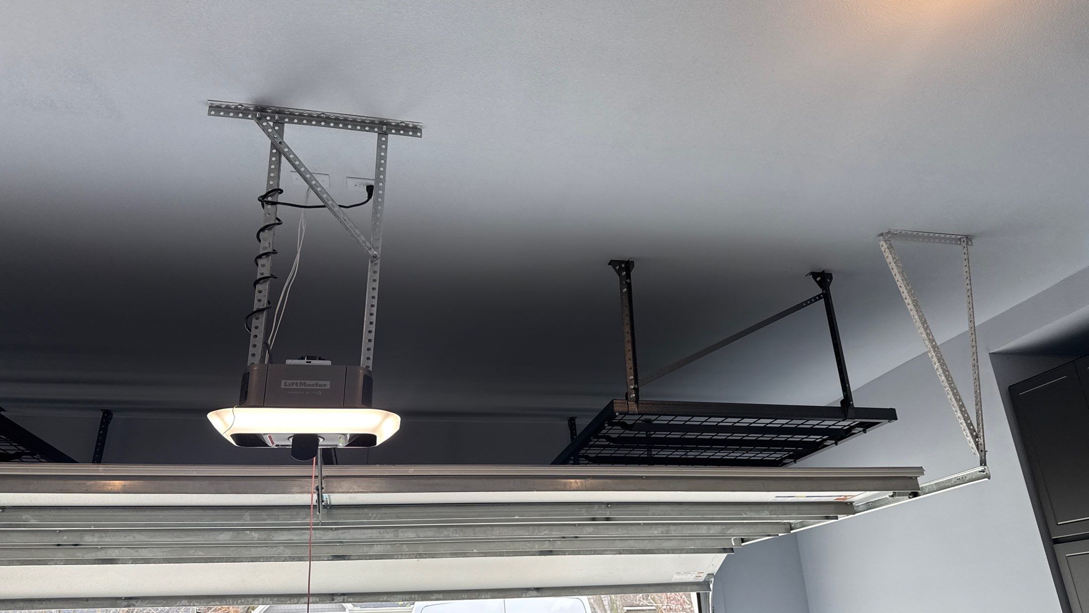Zac Maximized Storage and Took Advantage of Ceiling Height by Banner Garage