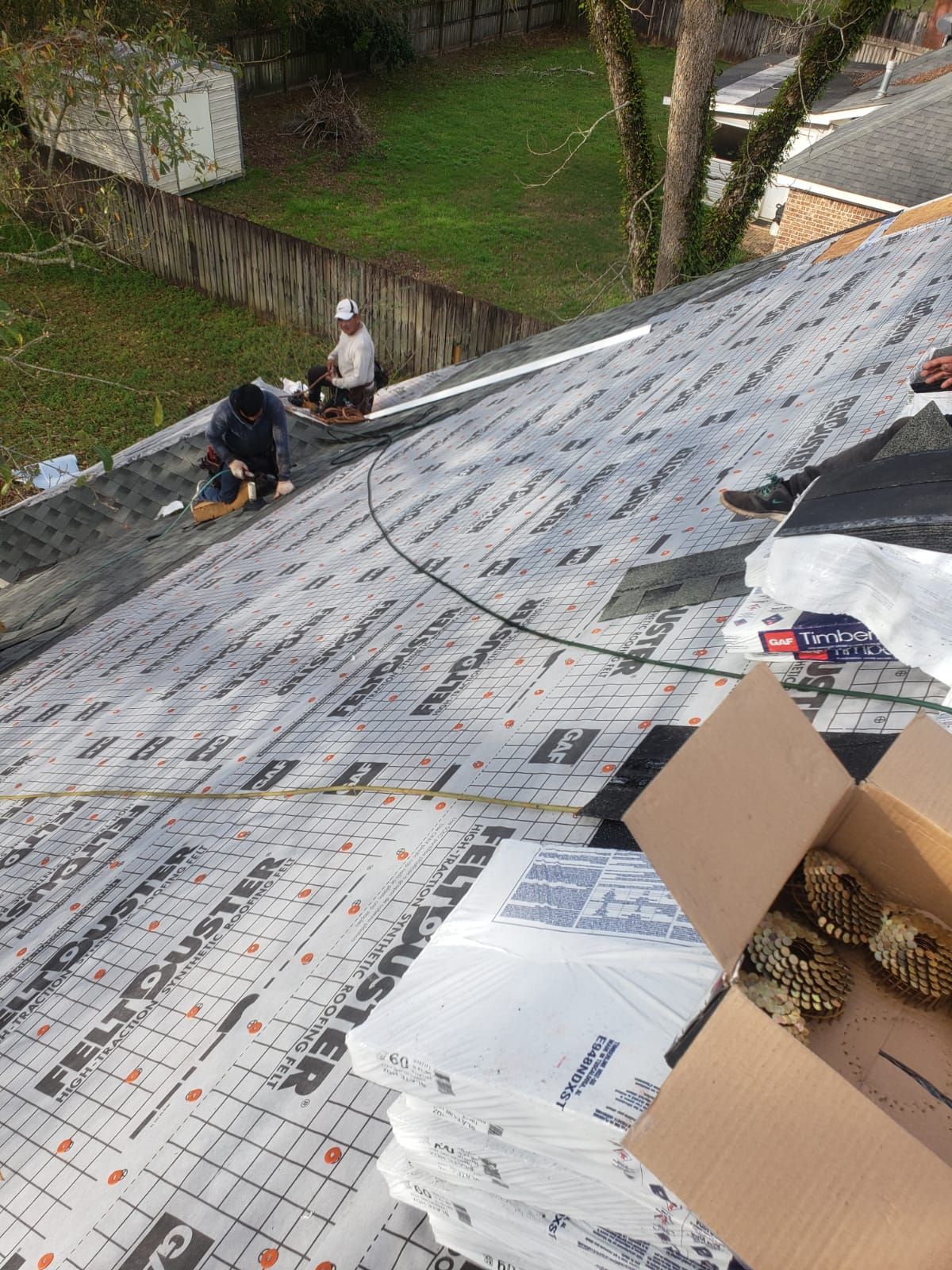 Residential Roofing Installation using Roof Replacement by American Roofing & Construction LLC