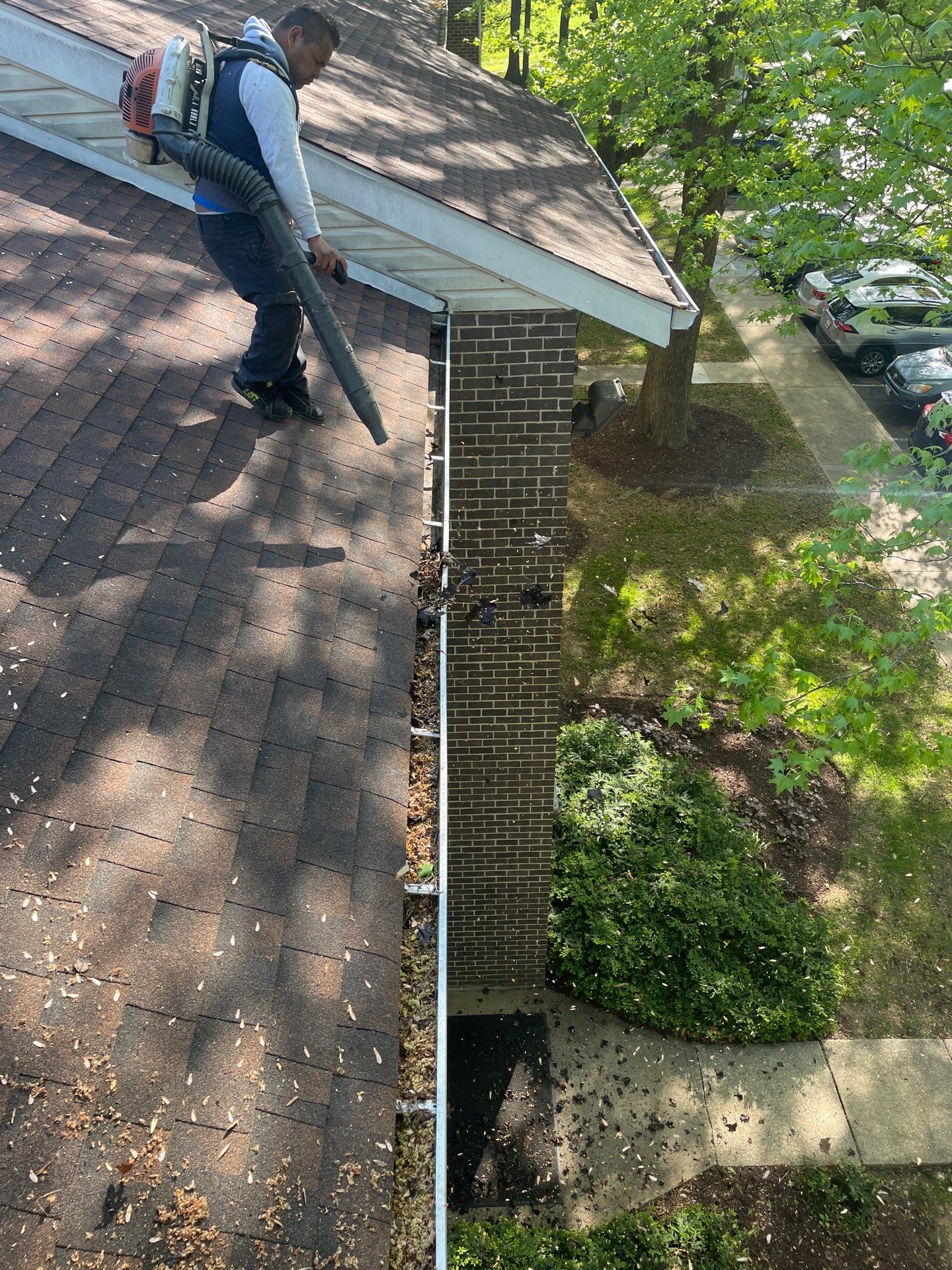 Commercial gutter cleaning Frederick, MD before photo with filled gutters