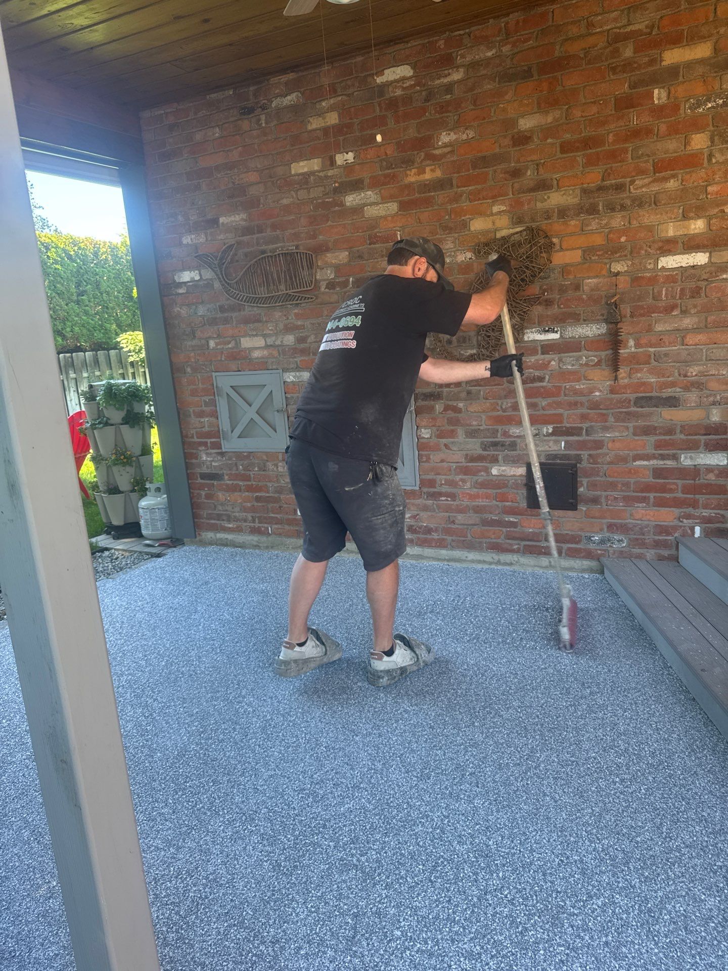 Patio Coating Transformation with Turquoise Hybrid Flake in Spokane by Croc Coatings, LLC