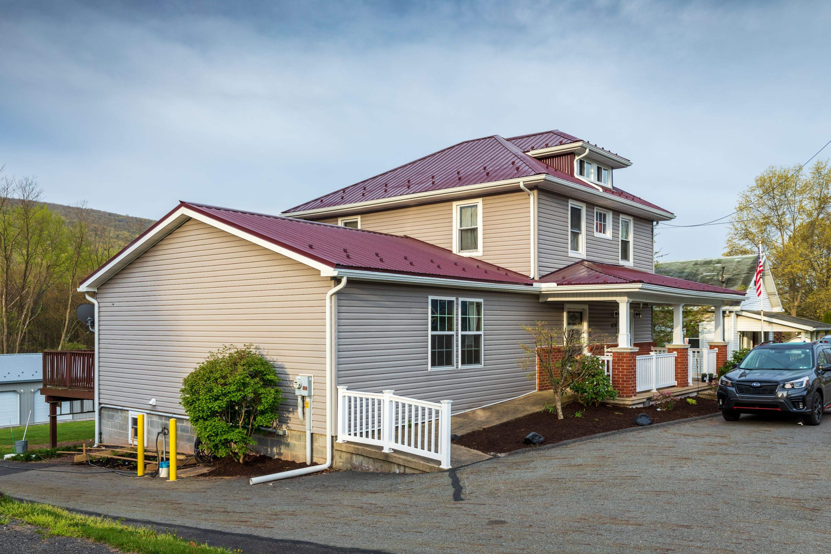 Metal Roof-burgundy by Esh Builders