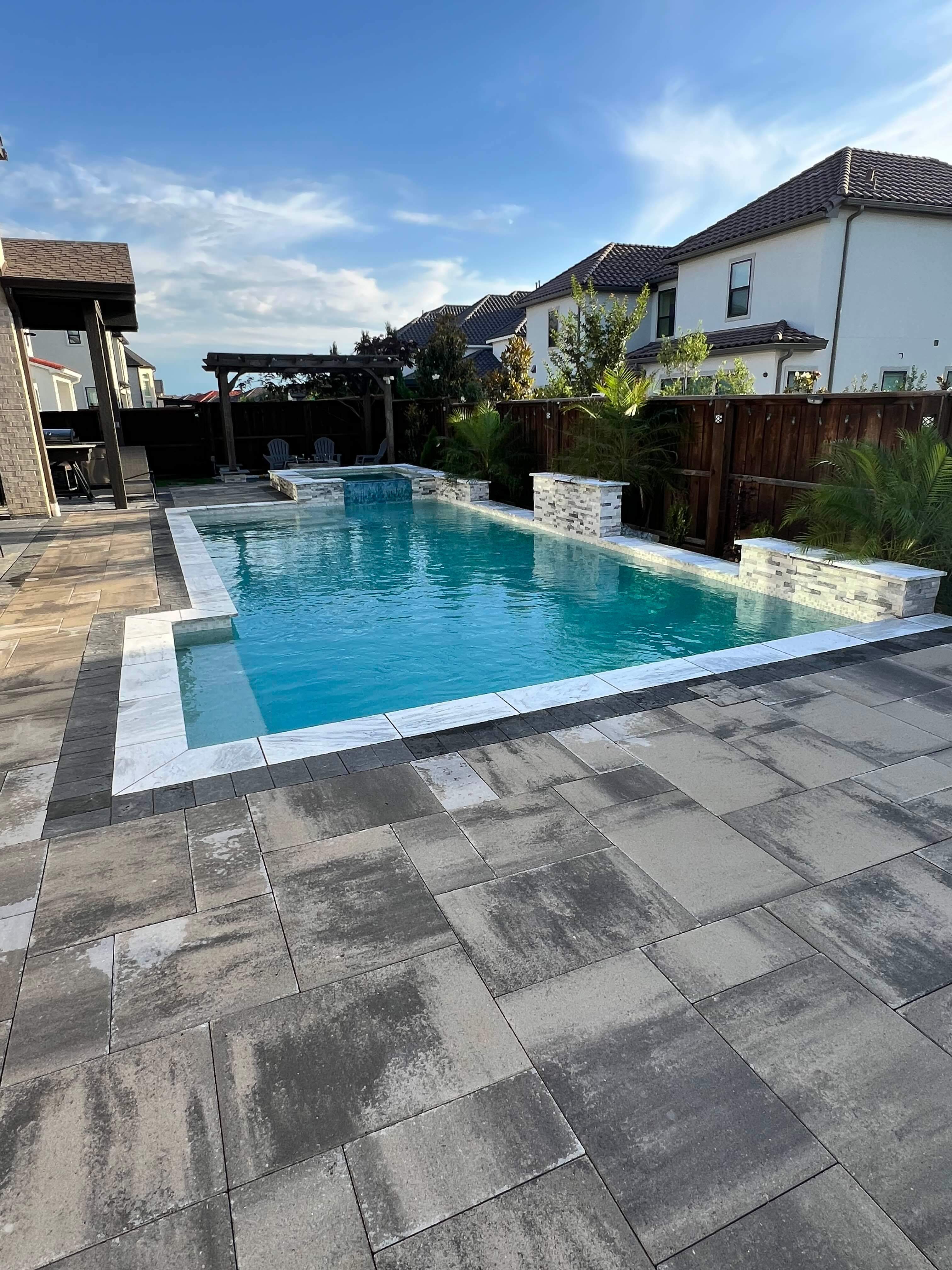 Modern Geometric Pool with Raised Spa by Pinnacle Pools and Spas - DFW