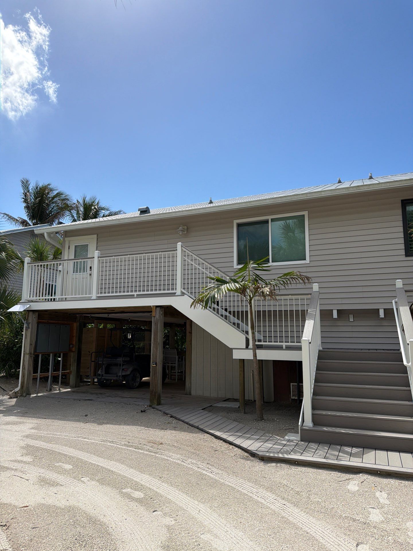 Elevated Deck and Composite Staircase Replacement in Placida Florida by Smirnov Construction Inc