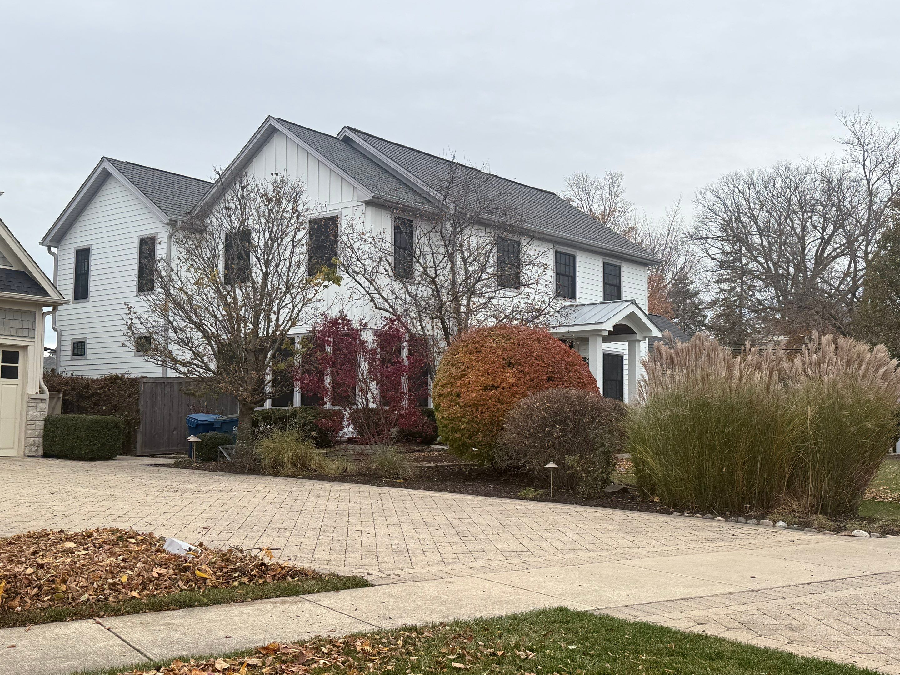 Exterior Renovation in Elmhurst with James Hardie Siding and Windows by Great American Exteriors