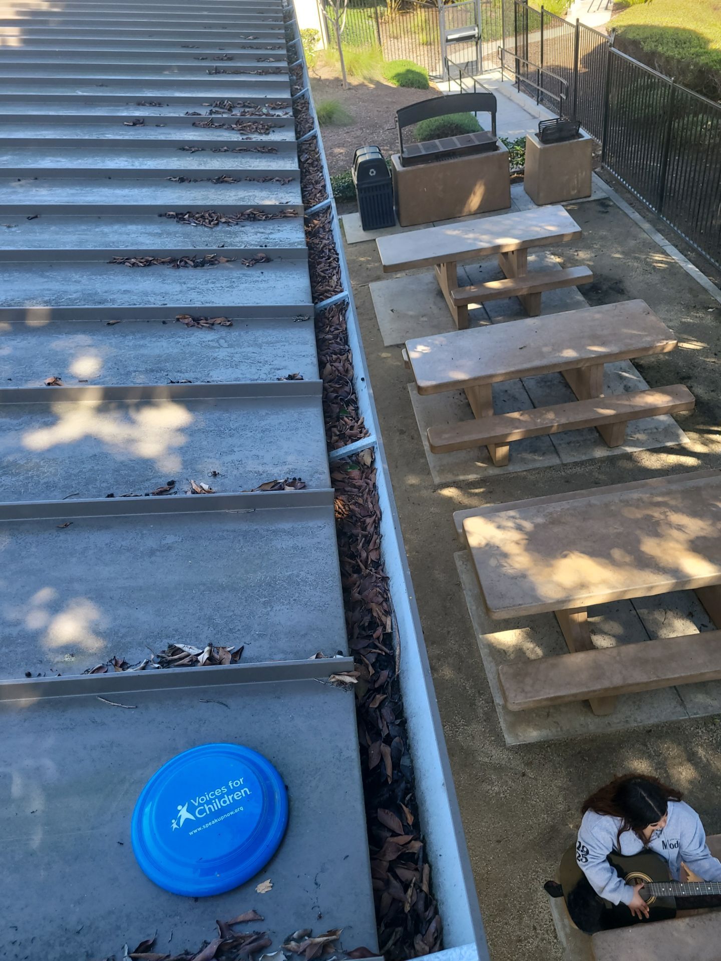Commercial gutter cleaning San Diego before photo with filled gutters