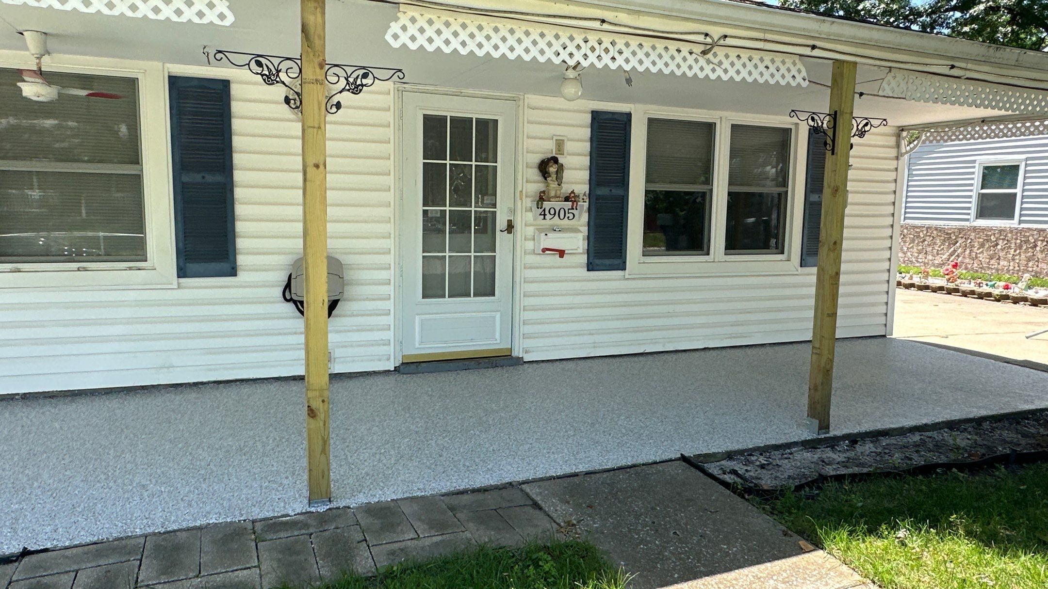 Look at this beautiful Coyote flake floor on this patio by Banner Garage