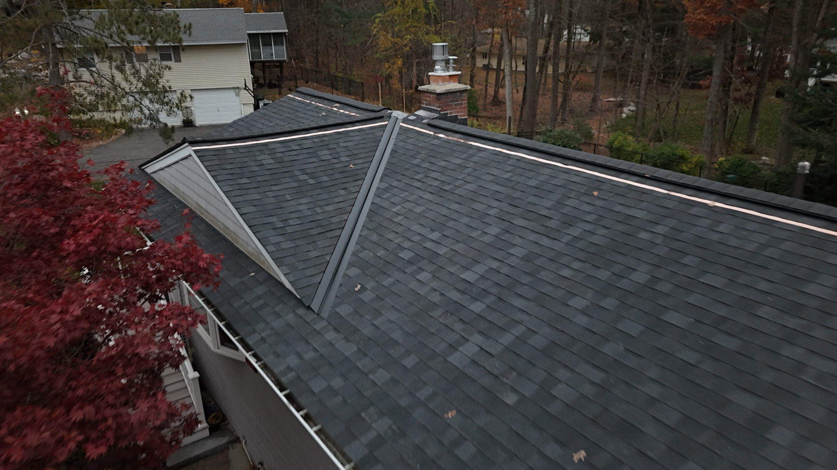 Chelmsford Complete Roof Replacement in Onyx Black with Balanced Ventilation by Mighty Dog Roofing of Greater Middlesex County