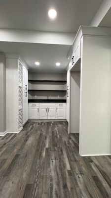 Modern Basement Finishing Project in Acworth Featuring Custom Wet Bar
