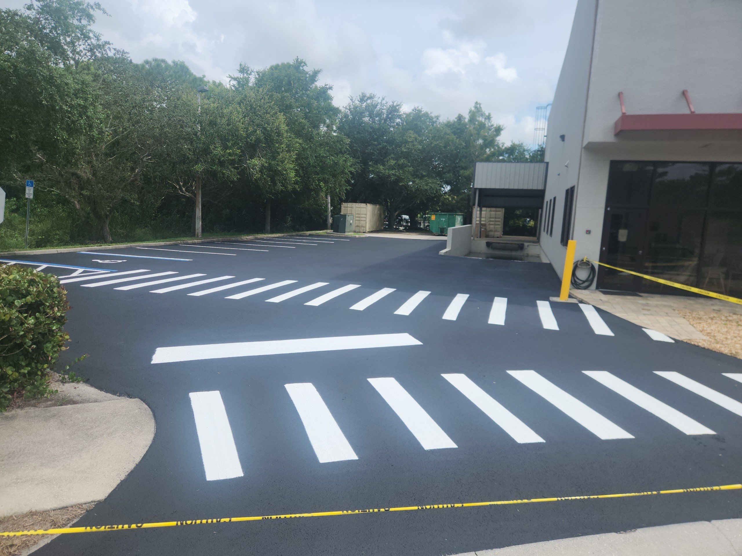 Delivery by Design Gets a Fresh Look: Sealcoating & Striping by Everline Coatings & Services - Southwest FL