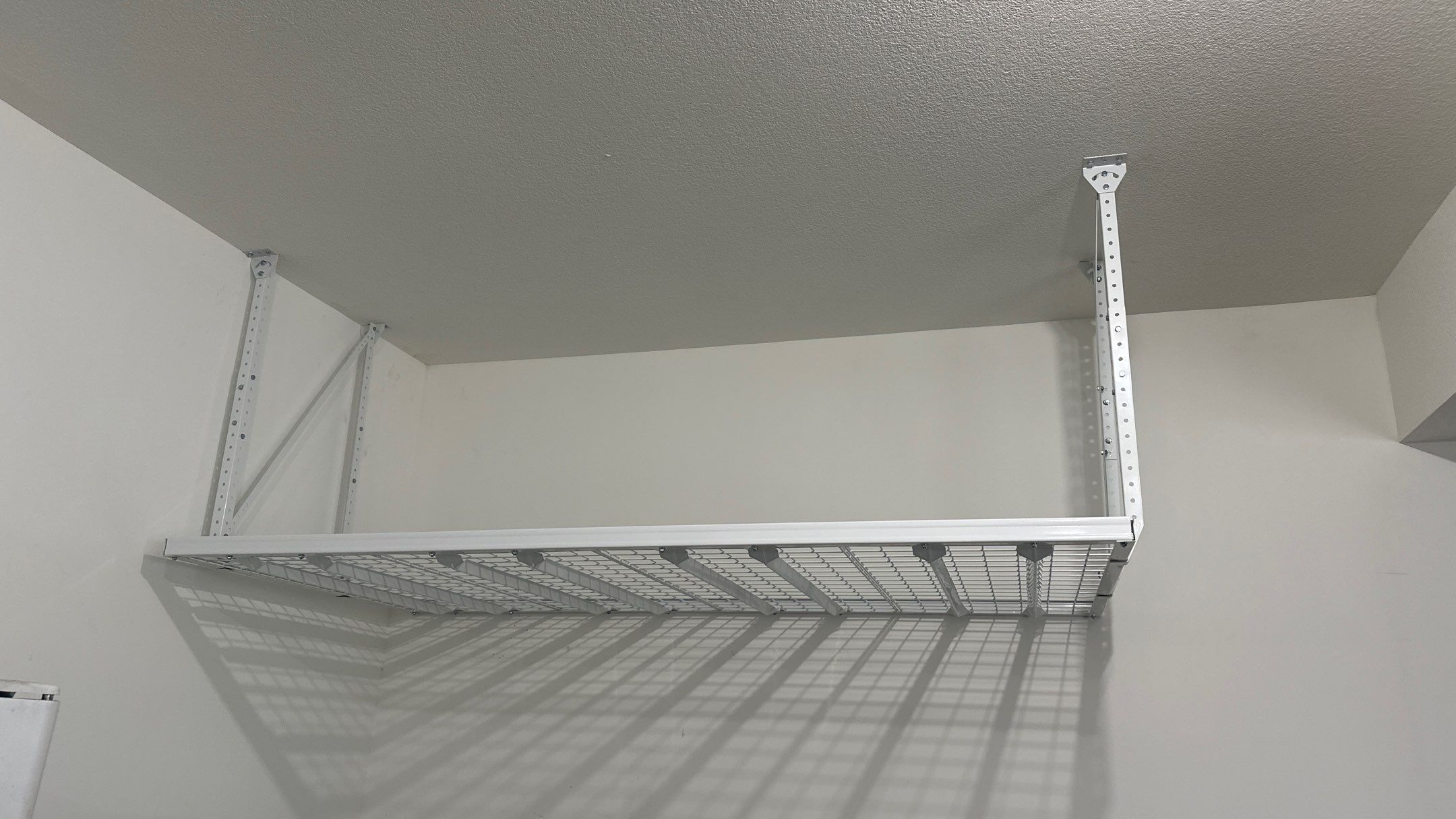 Gary J. upgraded his garage with overhead racks by Banner Garage