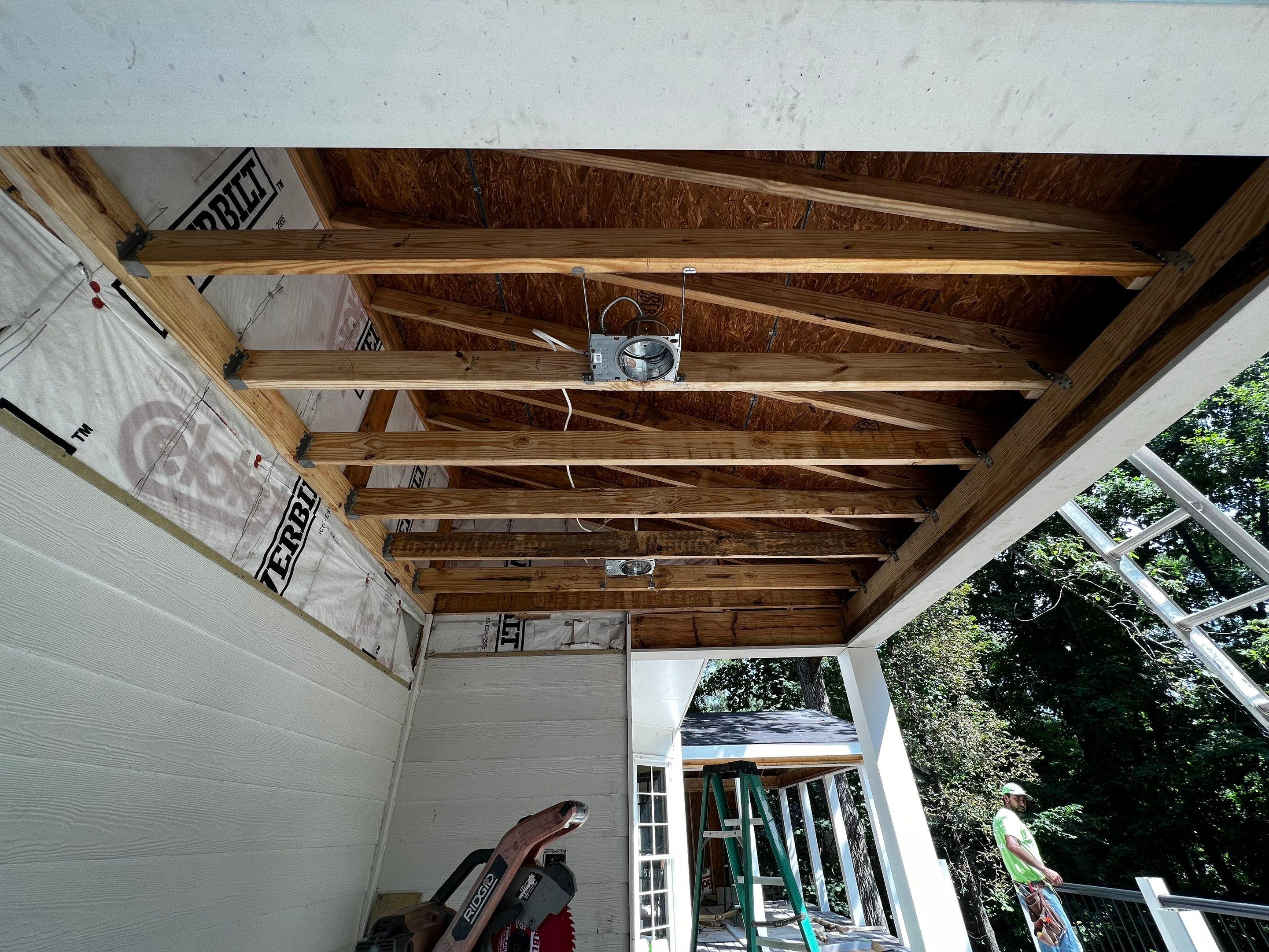 Elevated Composite Deck and Screened Porch Construction in Duluth by Swift Home Renovations 