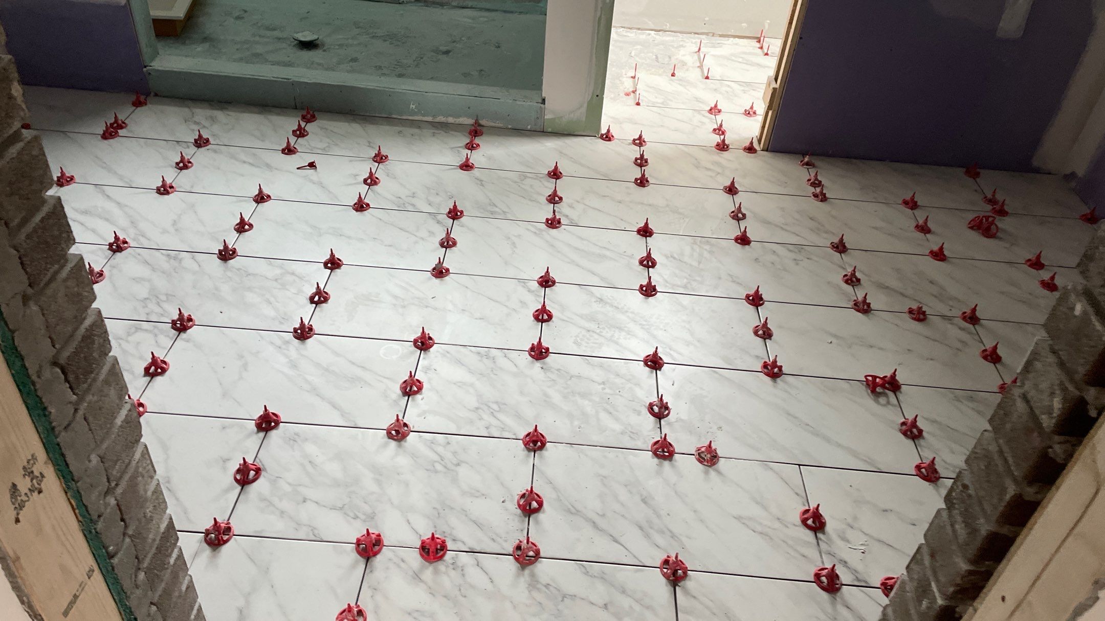 Remodeled Home with new tile floors, Showers and Refinished Oak Floors with stain and Waterbased Finish by Footprints Floors of Coastal Carolina