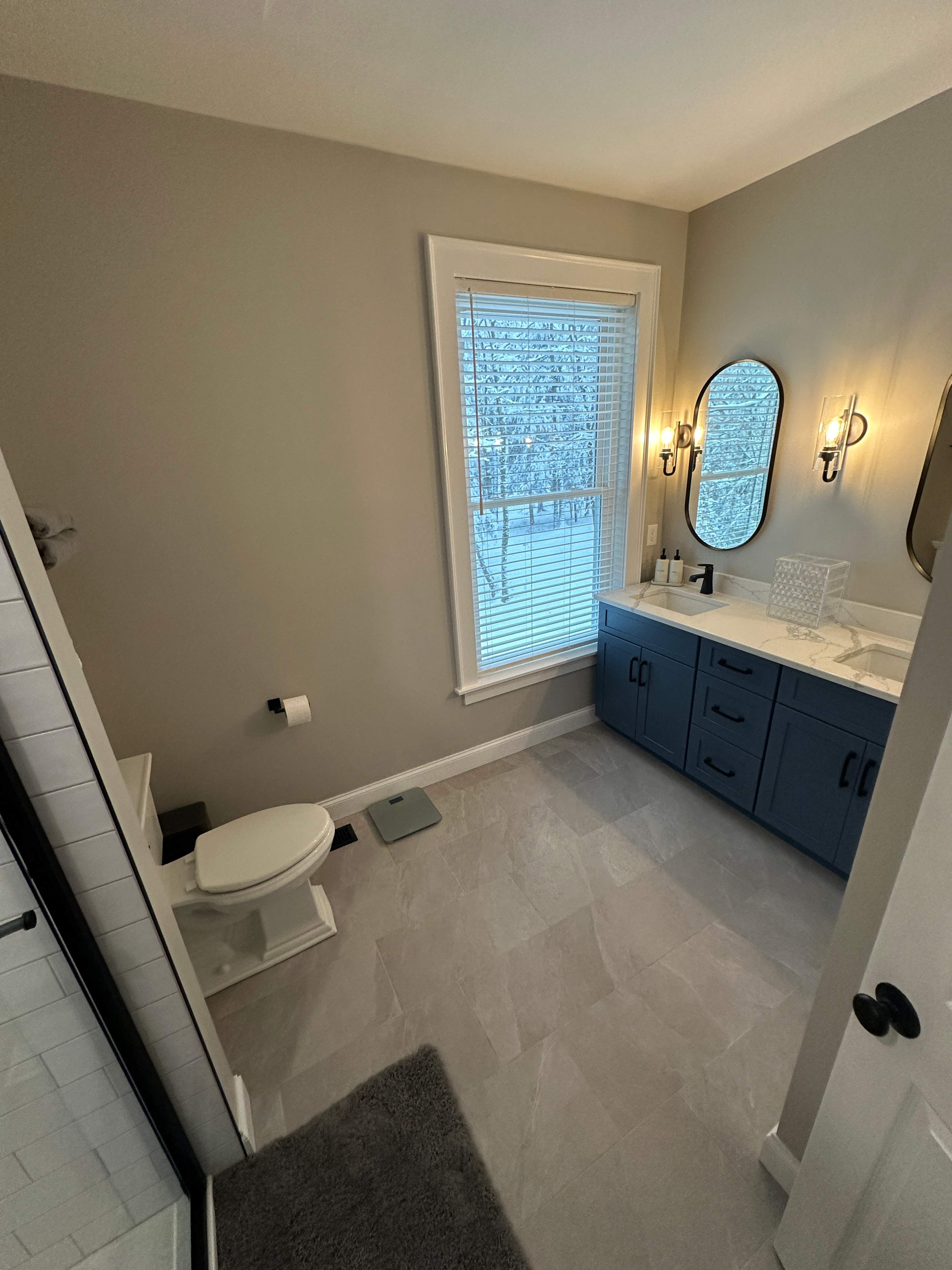 Double Bath Remodel by Renovatic LLC