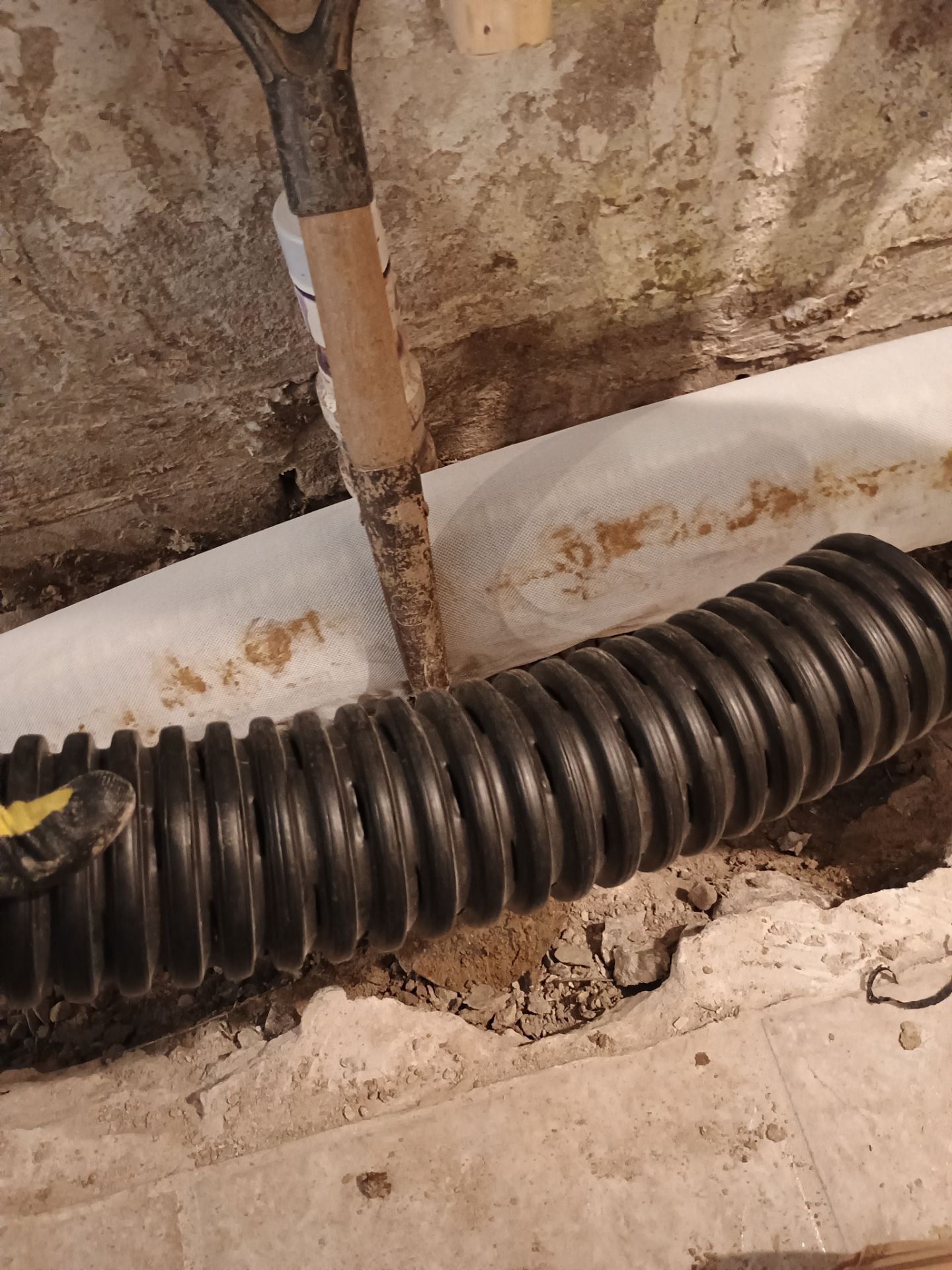 Drain Tile in Minneapolis for Kristen & Taylor by Waterproofing Northeast