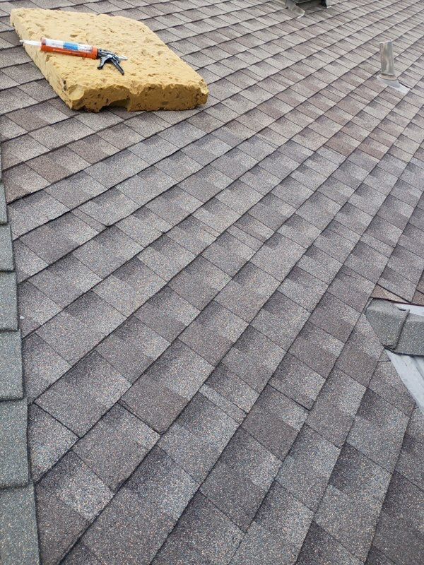 chimney flashing and roof repair in Edmond by McCann's Roofing and Construction