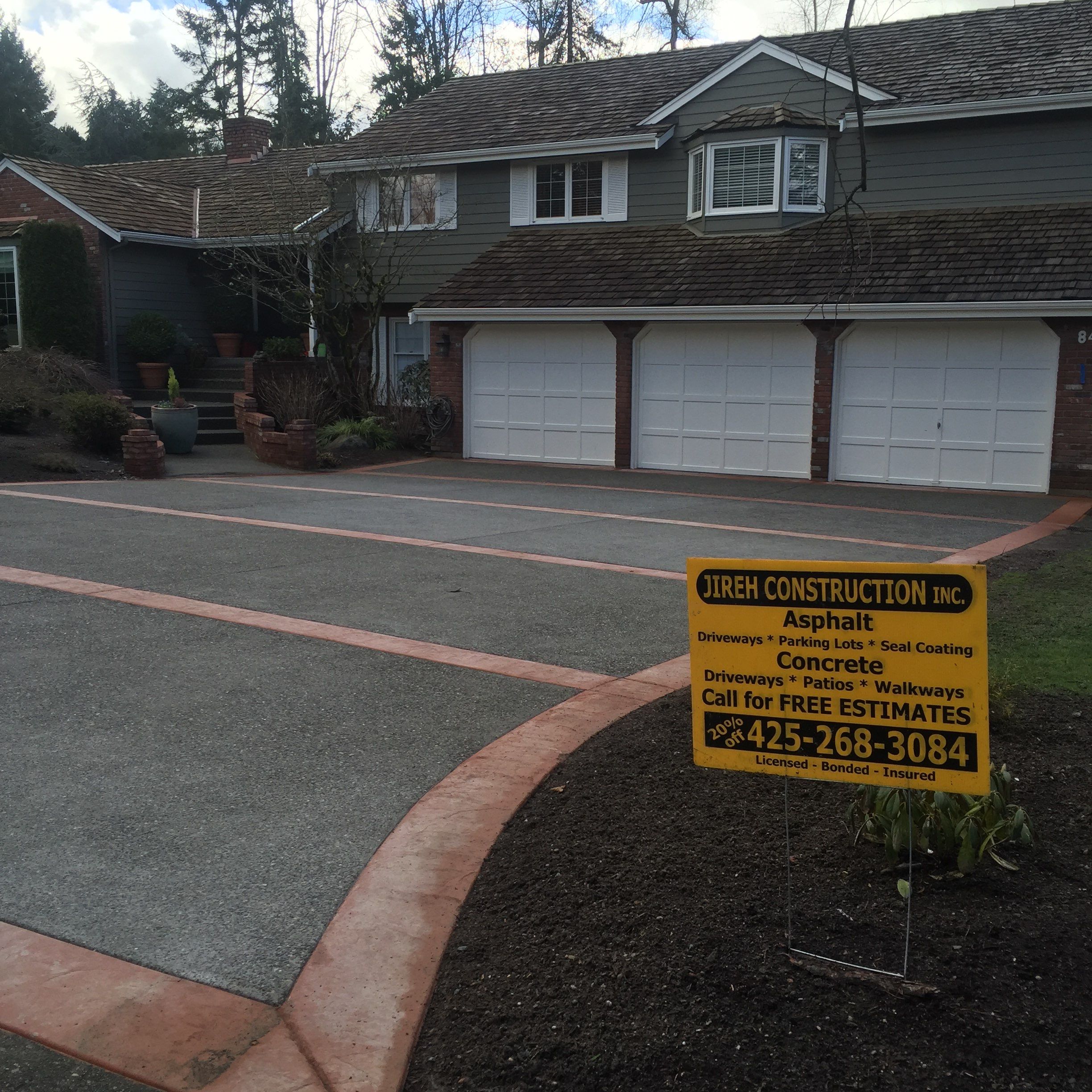 Custom Aggregate Driveway and Stamped Finish  by Jireh Asphalt & Concrete Inc 
