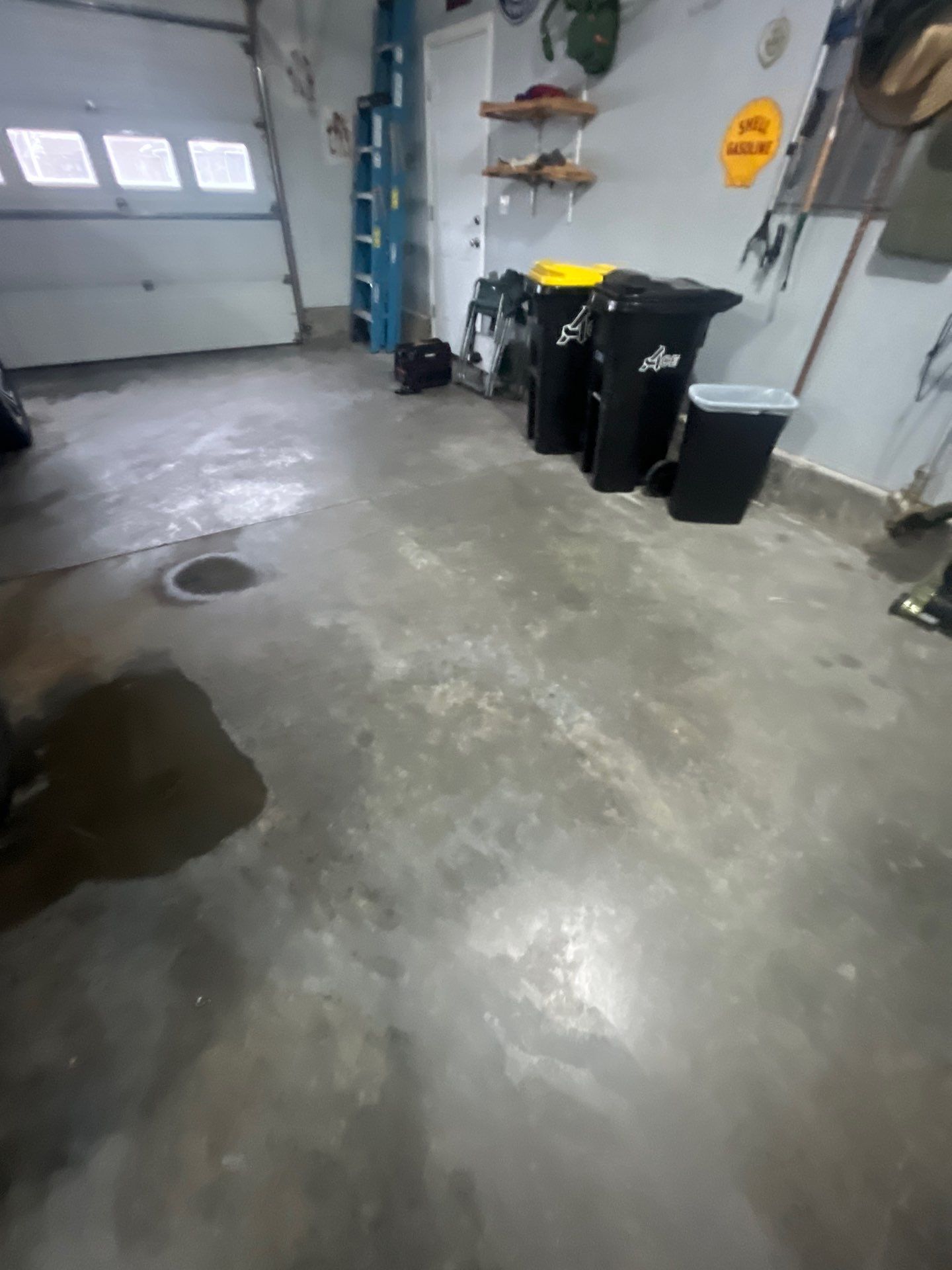 High-Gloss Epoxy Garage Floor Coating in Sioux Falls by Select Painting, Coatings & Garage Cabinets