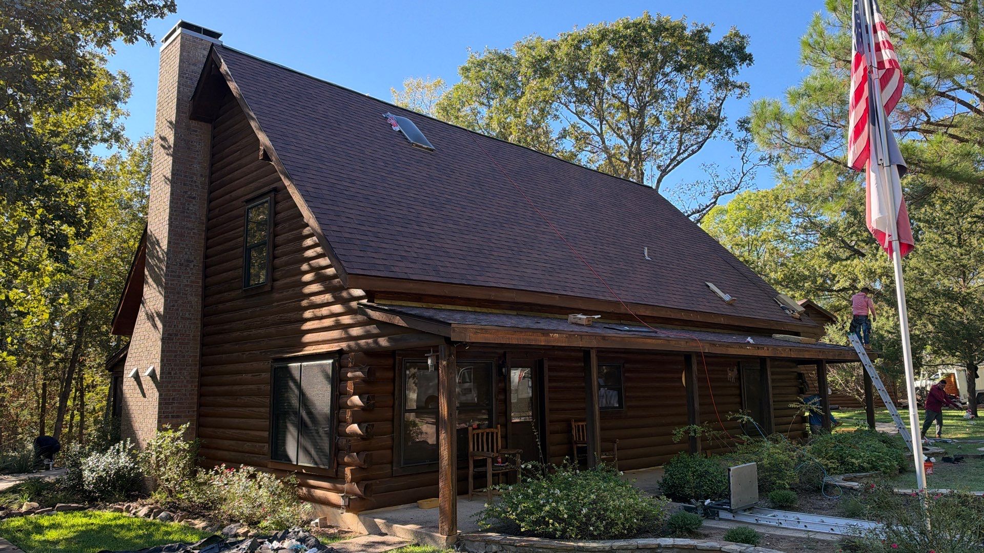 Multi-Building Log Cabin Roof Replacement with Architectural Shingles in Quitman by Armor Roofing | Exteriors