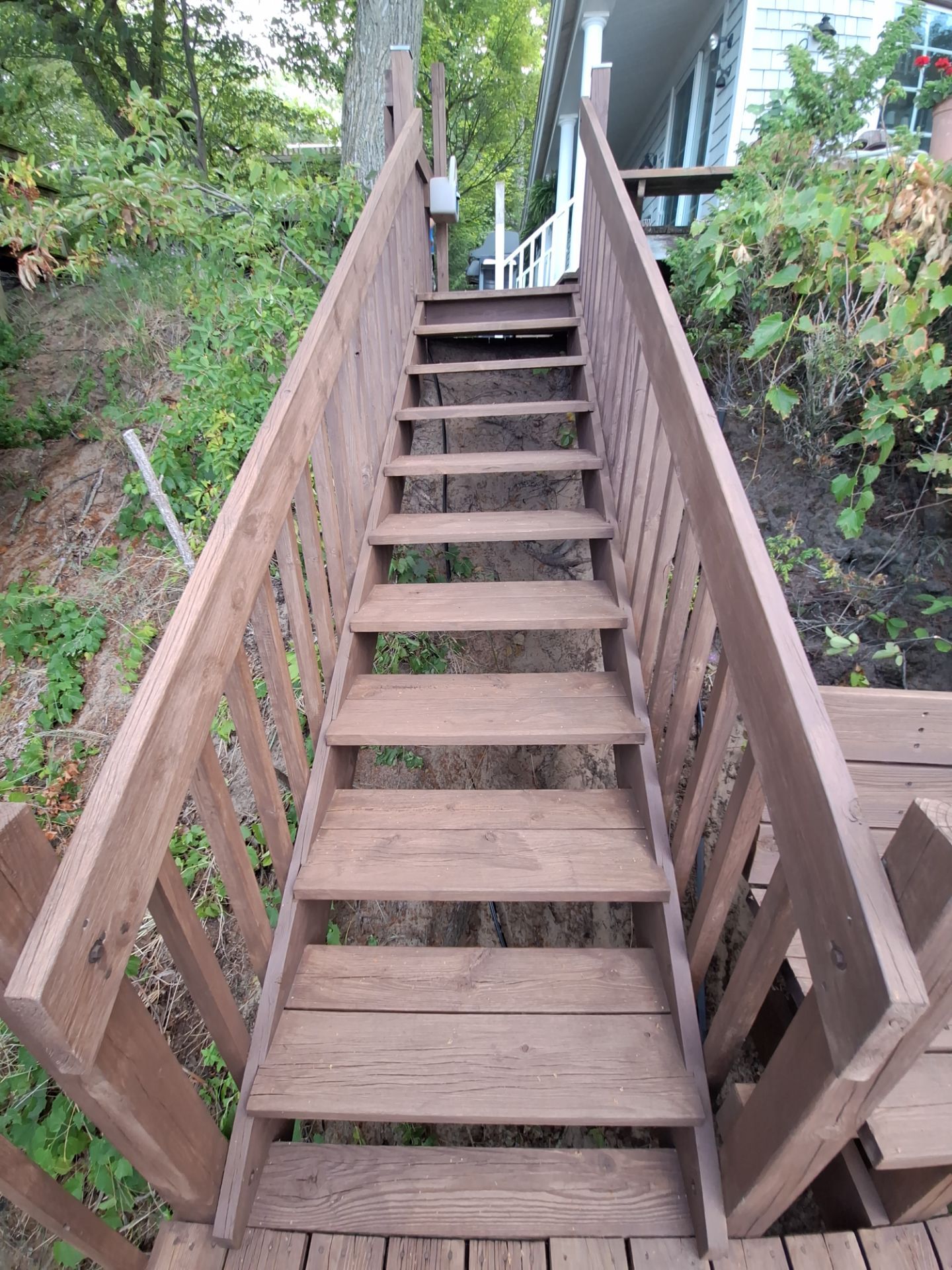 Lakefront Deck Pressure Washing, Exterior Wood Staining, and Painting in West Olive MI by Gordon Painting