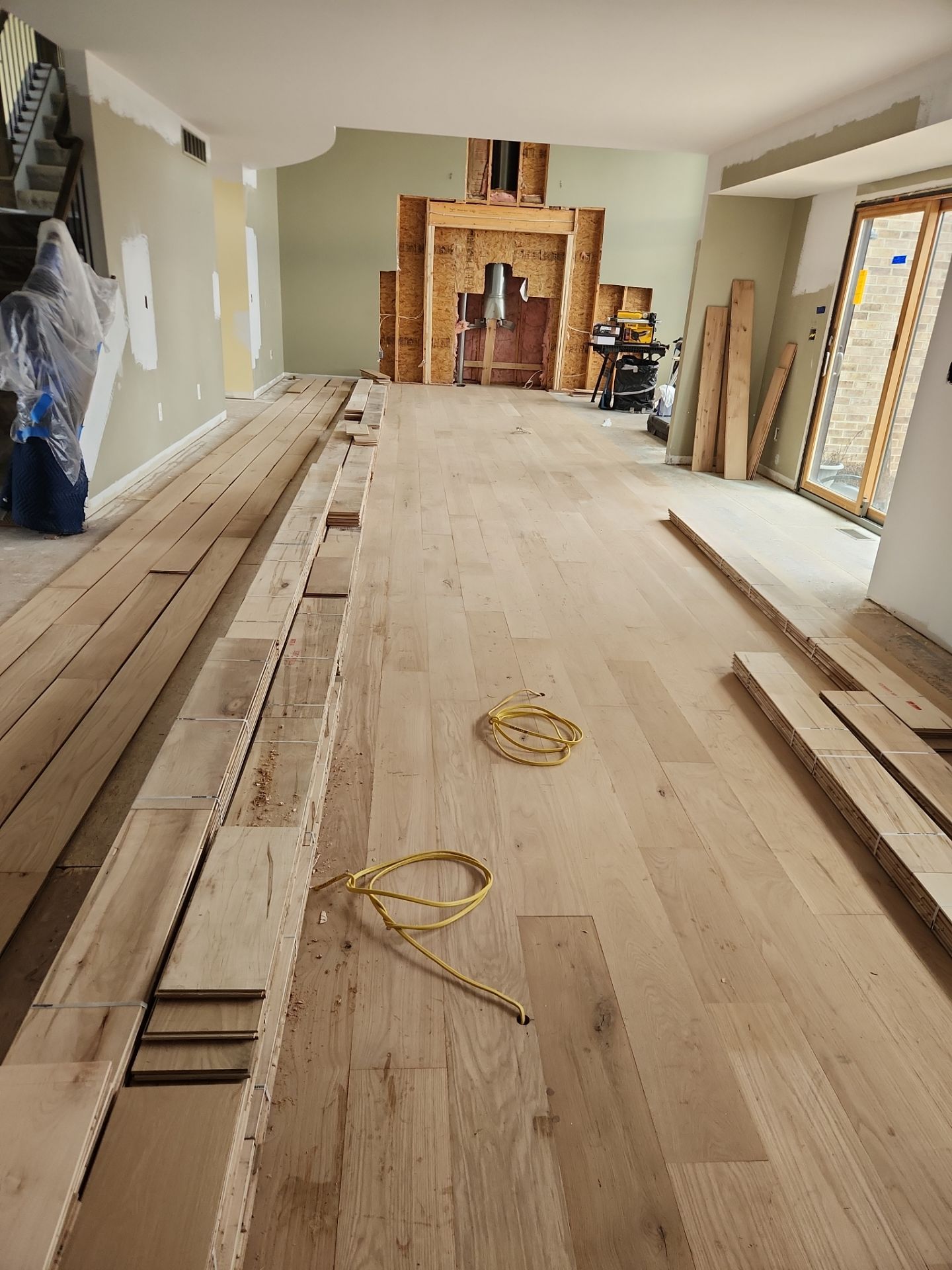  7 inch wide engineered  White Oak site sand and finish by Ann Arbor Hardwoods 