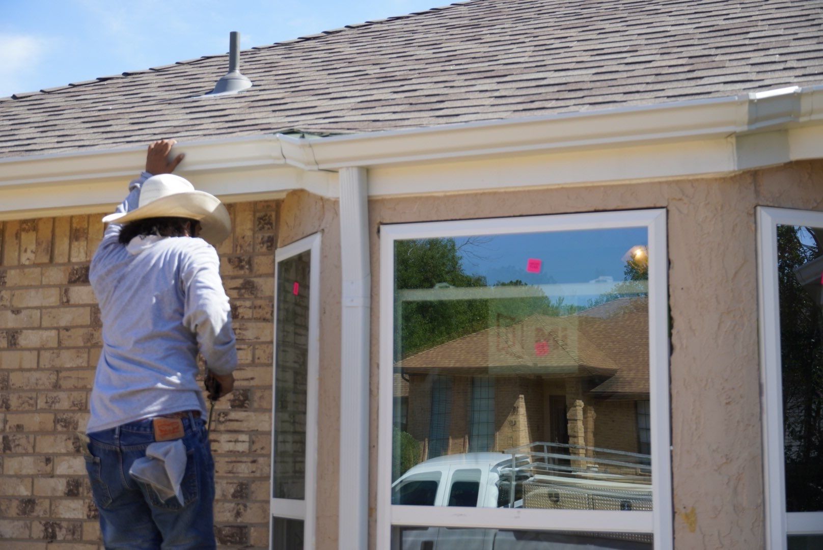 Low-E Window Replacement by First Out Roofing 