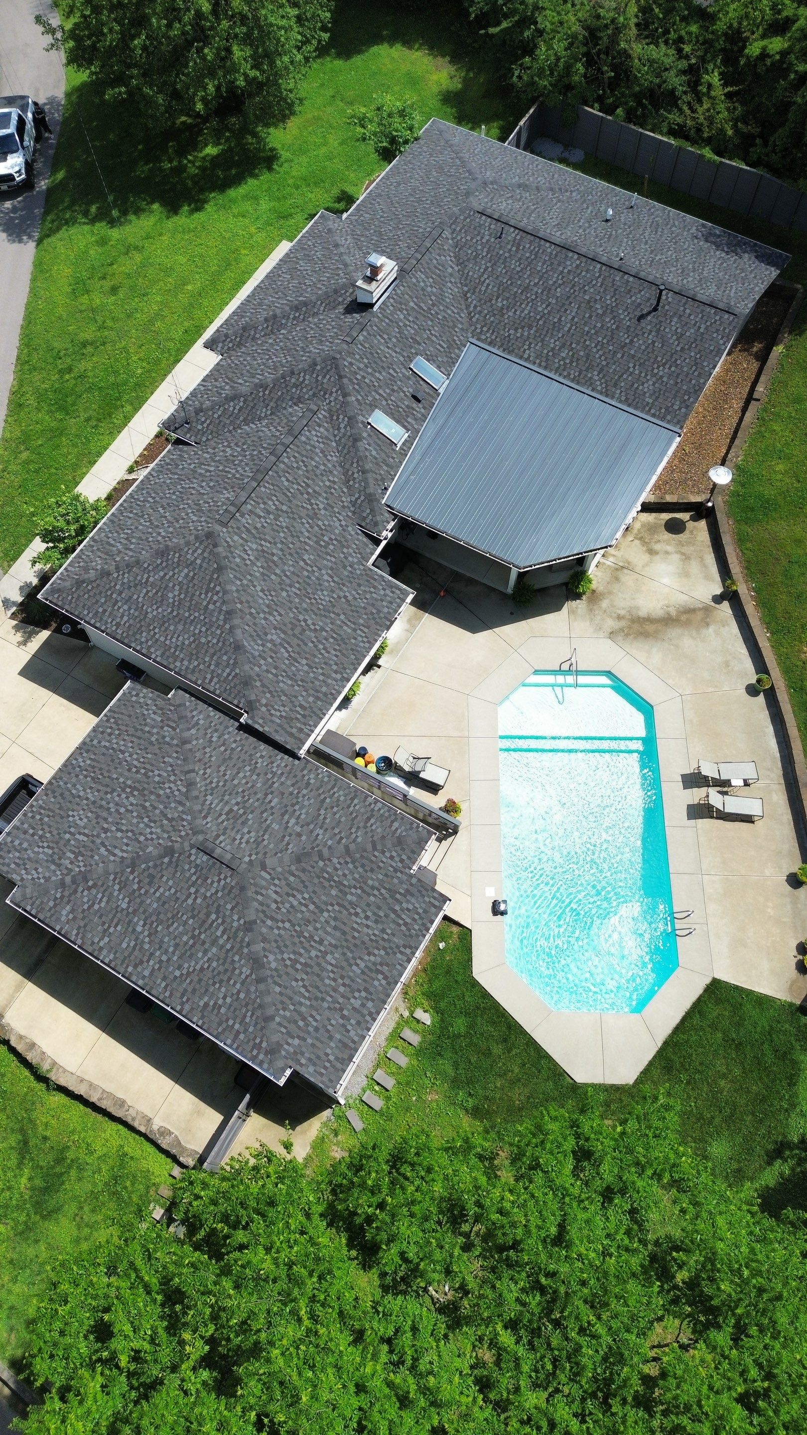 Residential Roofing Installation using GAF Timberline HDZ and Standing Seam Metal by Undersun Roofing 