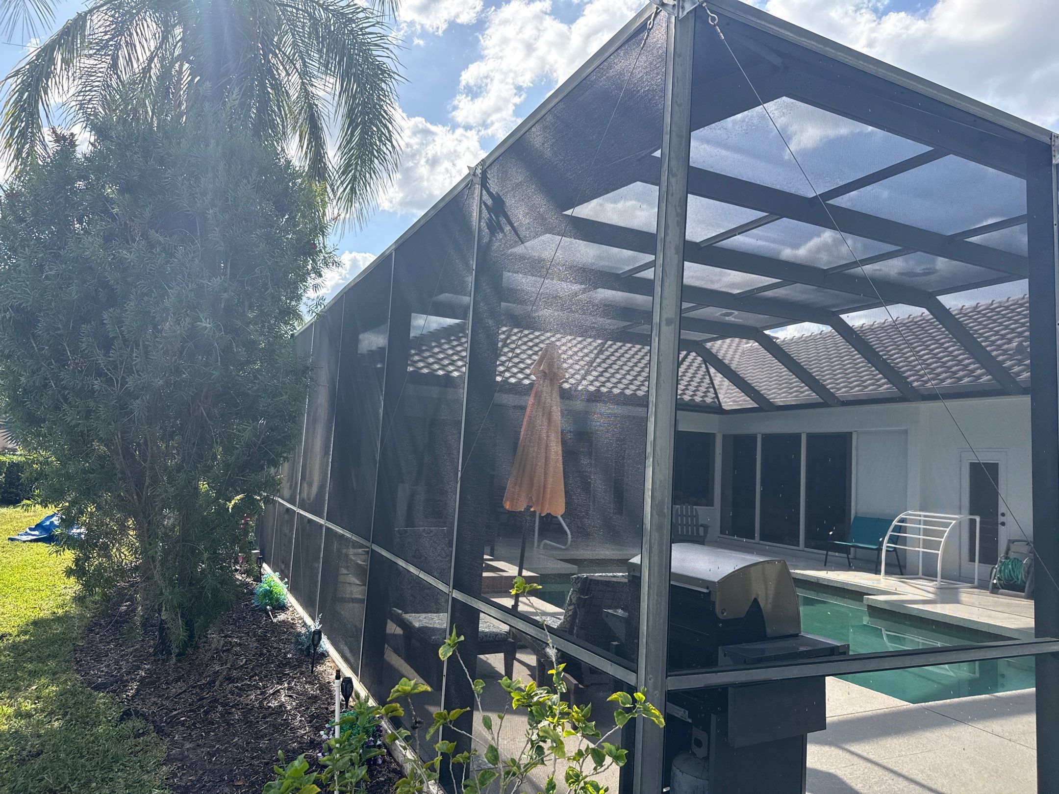 Painted Pool Deck, Lanai & Pool Cage Cleaning in River Club South – Bradenton, FL by Sunshine AquaWash