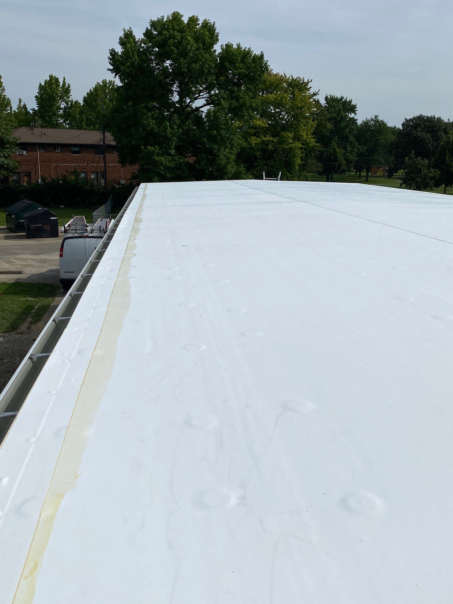 Commercial Flat Roof and Siding by Nitro Roofing and Construction
