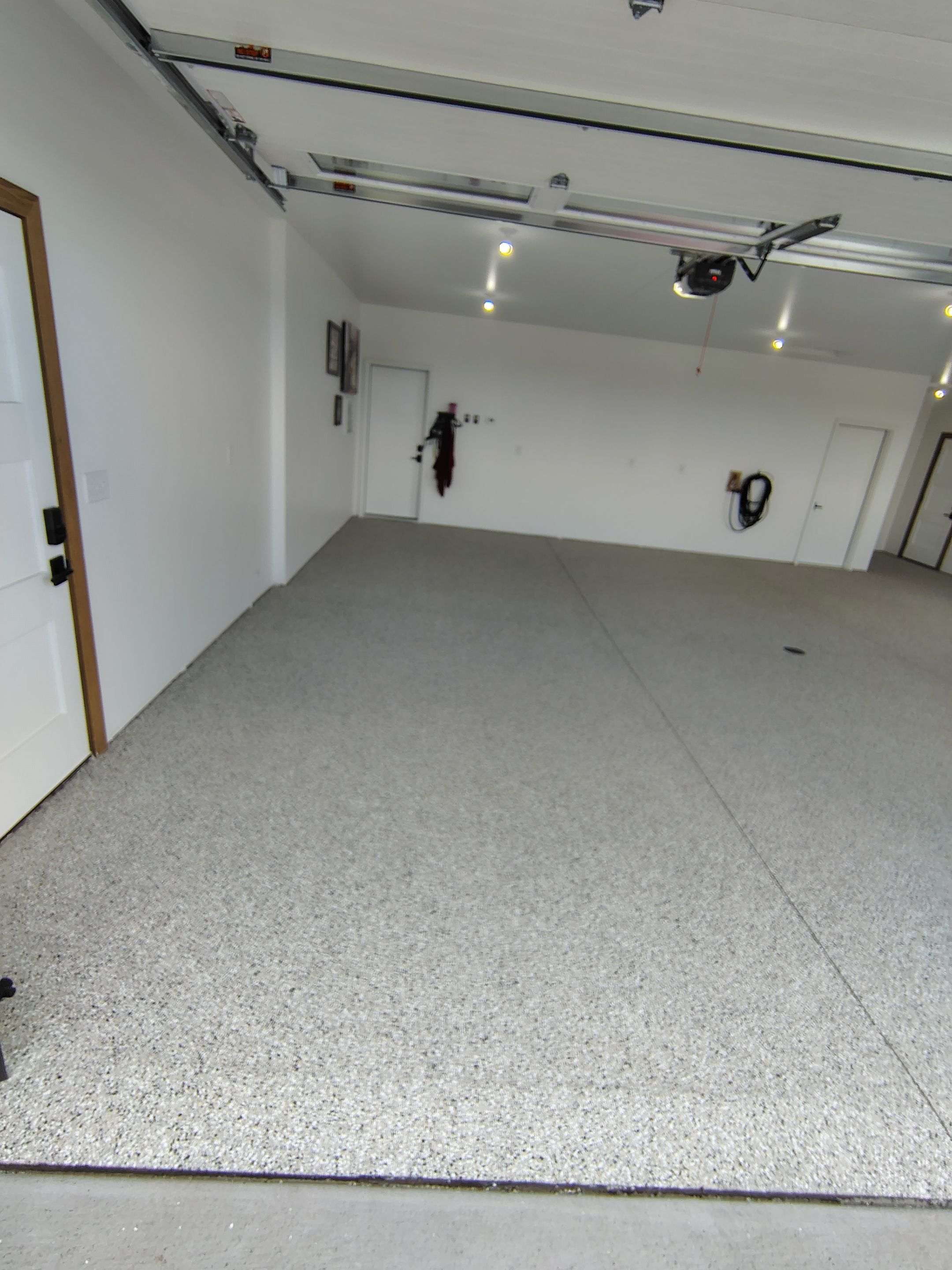 Gray and White Speckled Epoxy Garage Floor Coating in Tea by Select Painting, Coatings & Garage Cabinets