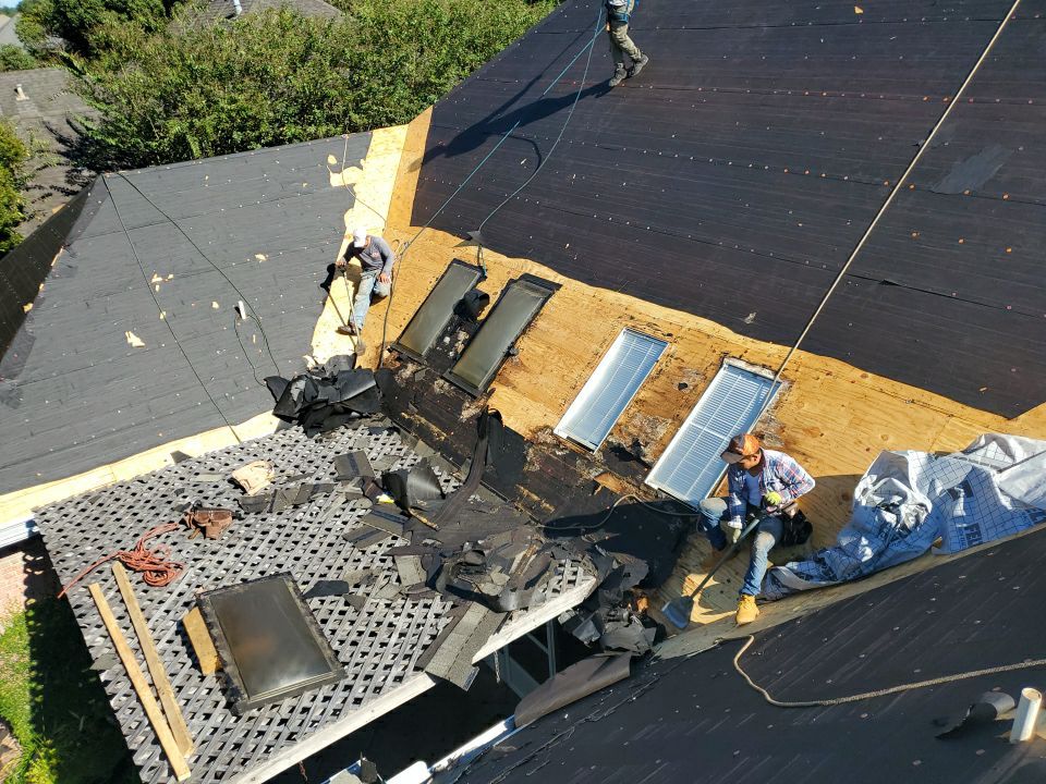 Residential Roofing Installation using Roof Replacement by American Roofing & Construction LLC