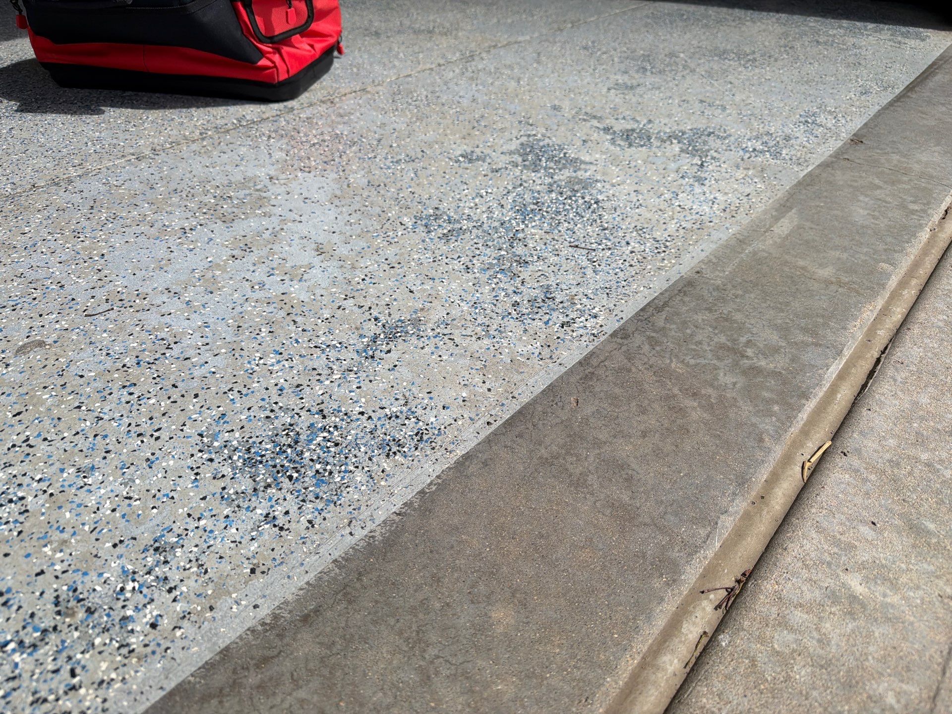 Residential Garage Floor Coating in Sioux Falls by Select Painting, Coatings & Garage Cabinets