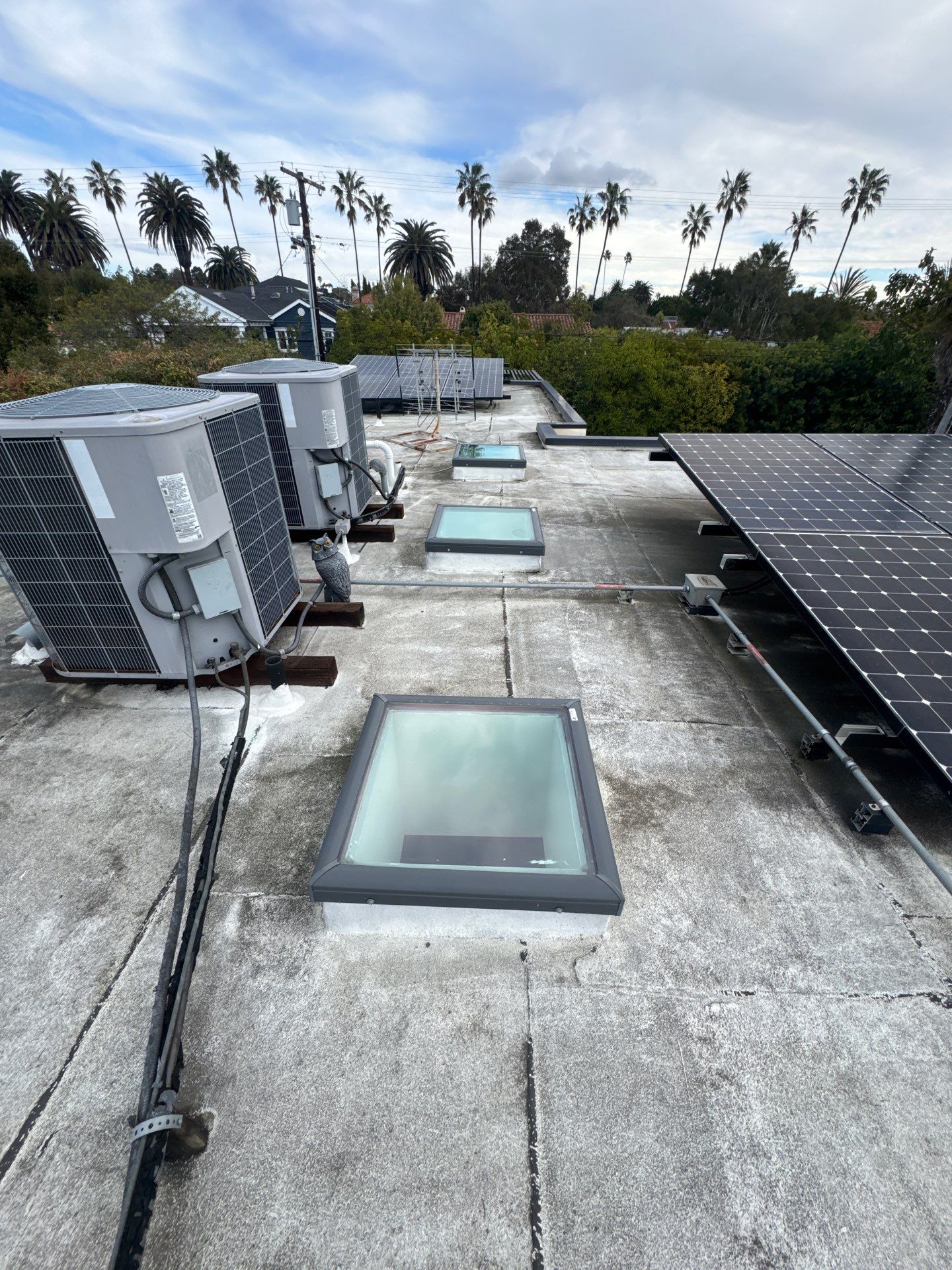 Silicone Membrane Installation using American Standard Coatings Silicone-S by Hull Brothers Roofing