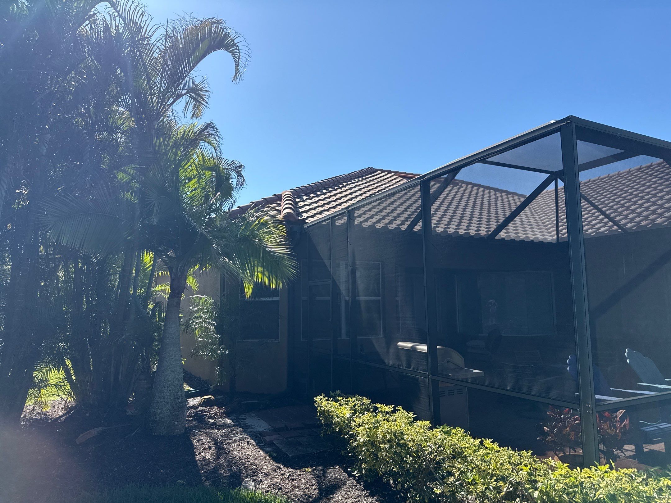 This project focused on a full gutter clean-out to restore proper water flow and prevent overflow issues.  Our scope of work included: 	•	Removing heavy leaf and pollen buildup from the gutter system 	•	Clearing out clogged sections along the rear gutters near the pool cage, where debris tends to accumulate more heavily 	•	Inspecting and cleaning the front gutter guards, which had several blocked areas restricting water flow 	•	Ensuring all downspouts and channels were flowing properly after service  Even with gutter guards installed, debris like pollen, shingle grit, and fine organic matter can still build up over time—especially in Florida’s environment. Regular maintenance helps prevent water damage, overflow, and staining on exterior surfaces.  Another thorough job completed by Sunshine AquaWash® – keeping homes protected from top to bottom. by Sunshine AquaWash