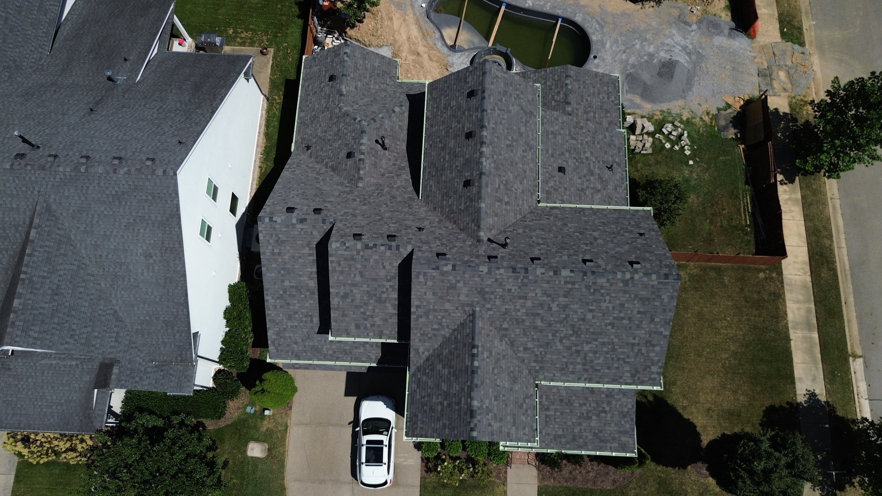 Malarkey Highlander Shingle Roof and Gutter Replacement in Franklin by Shinglesmiths Roofing
