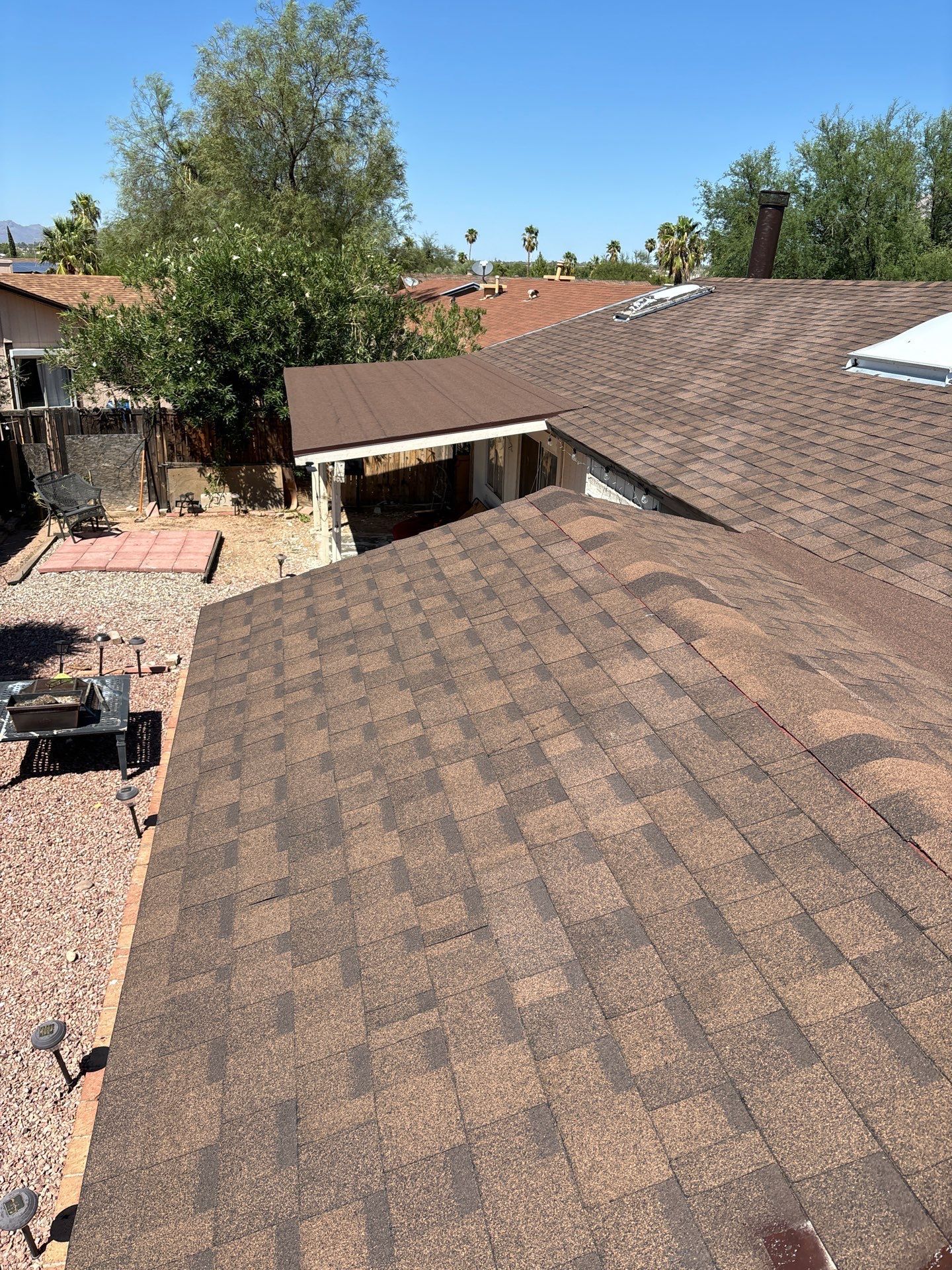 Brownwood Shingles by Reimagine Roofing