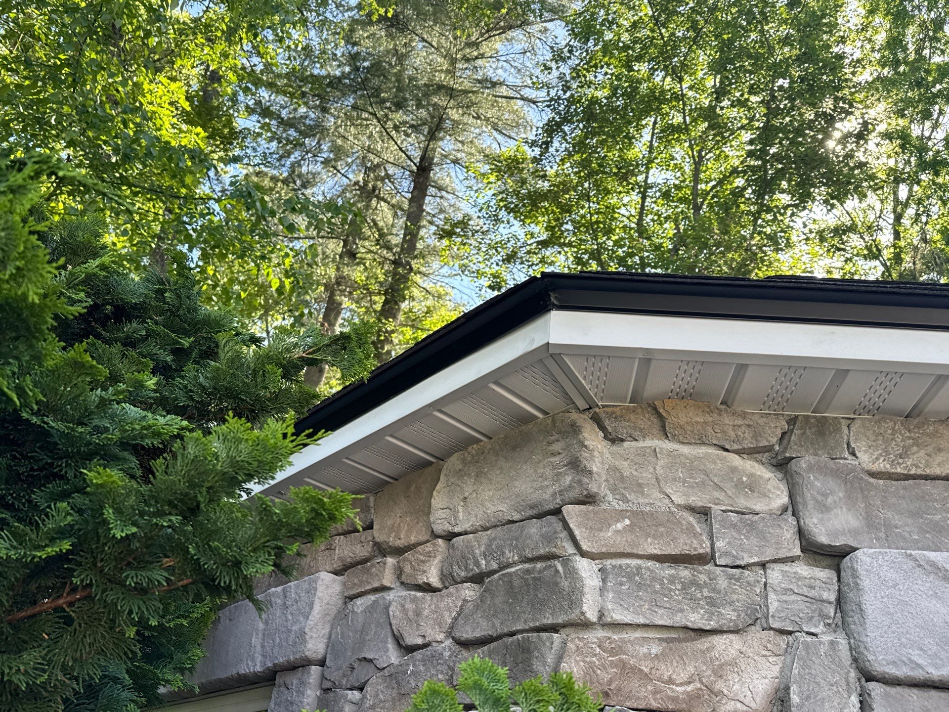 Roof Replacement on Cobbetts Pond in Windham, NH with Owens Corning Onyx Black Shingles by Compass exteriors