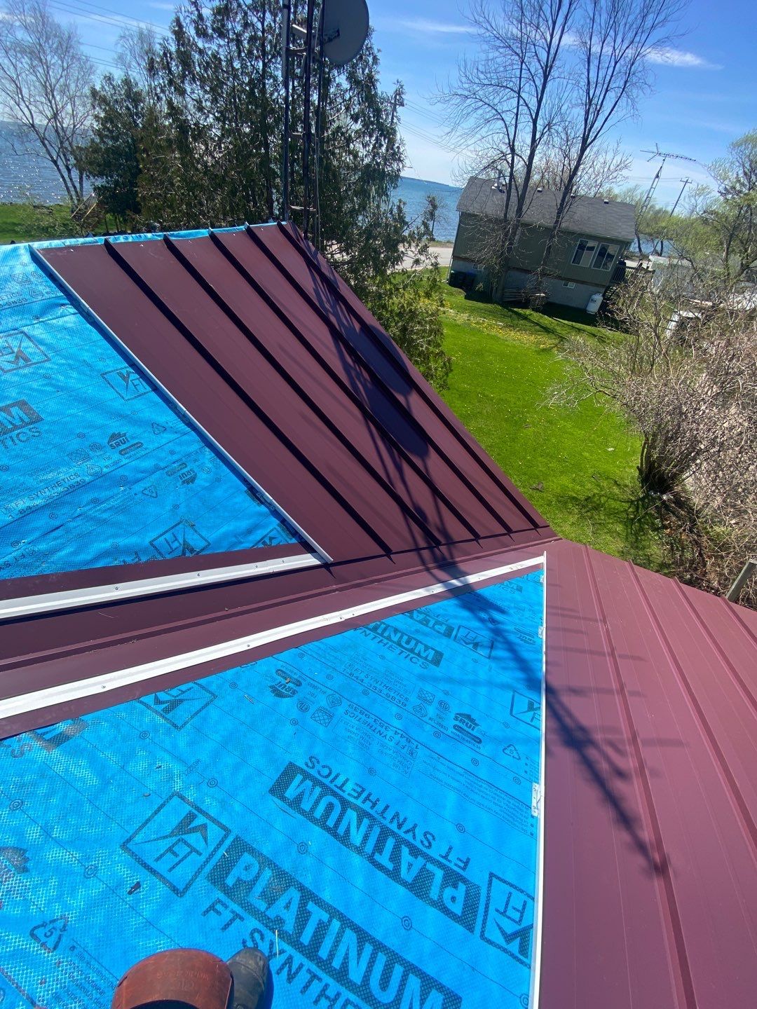 Residential Roofing Installation using 16" Standing Seam Panels by Jay Carter Roofing & Sheet Metal