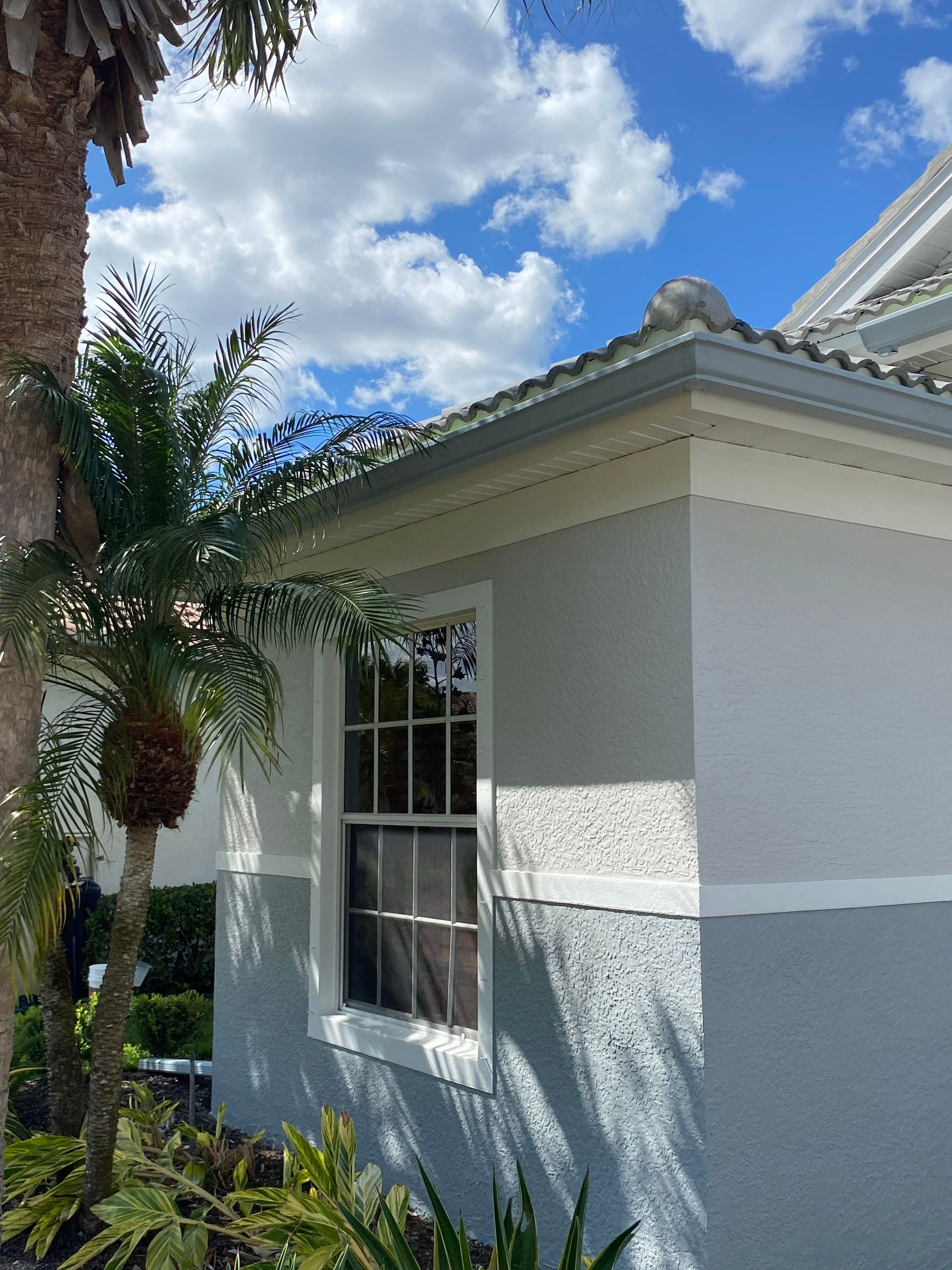 6-inch K-style Seamless Gutters and Splash Guard in Grey Color in Naples FL by Gutter Professors