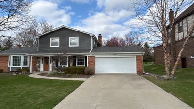 Siding Replacement using Alside Charcoal Smoke and Roof Replacement using Owens Corning Peppercorn