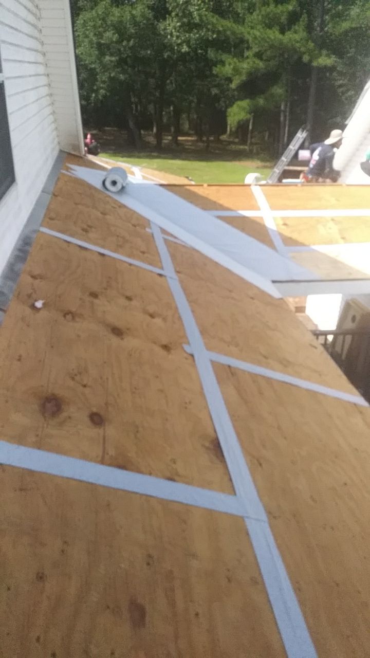 Residential Roofing Installation using Roof Replacement by American Roofing & Construction LLC