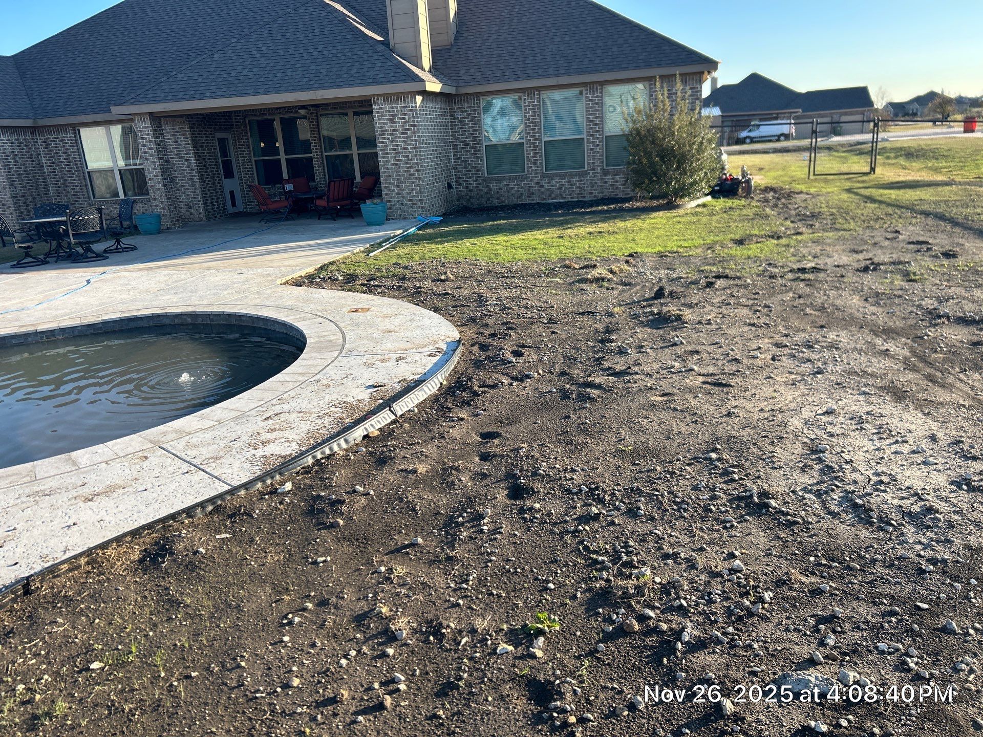 Freeform Pool with Expansive Concrete Deck by Pinnacle Pools and Spas - DFW