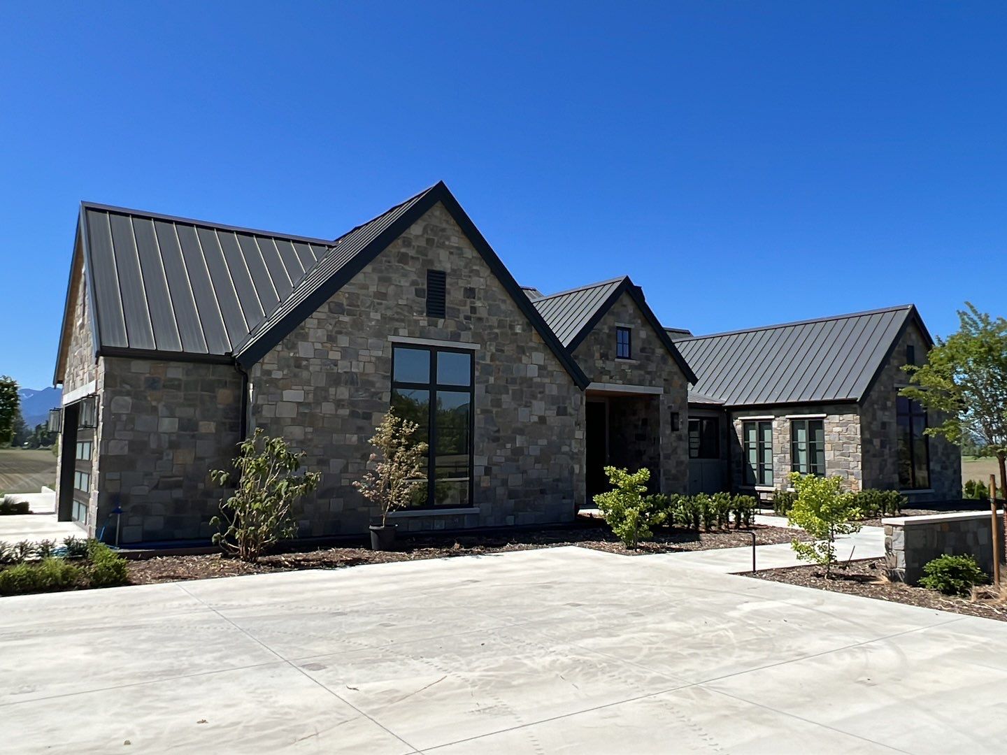 Residential Roofing Installation using 12" Prolok metal  by Top Notch Roofing Inc