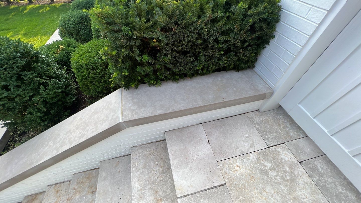 marble patio cleaning and sanding using Polysweep polymeric sand by Northern Power Washing LLC.