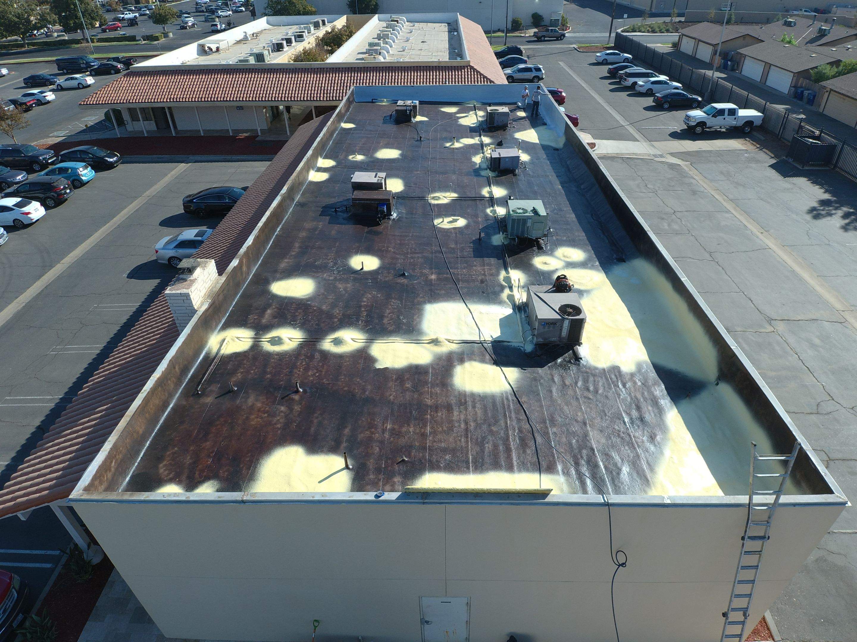 Reburbish existing spray foam job by Straight Edge Roofing Inc
