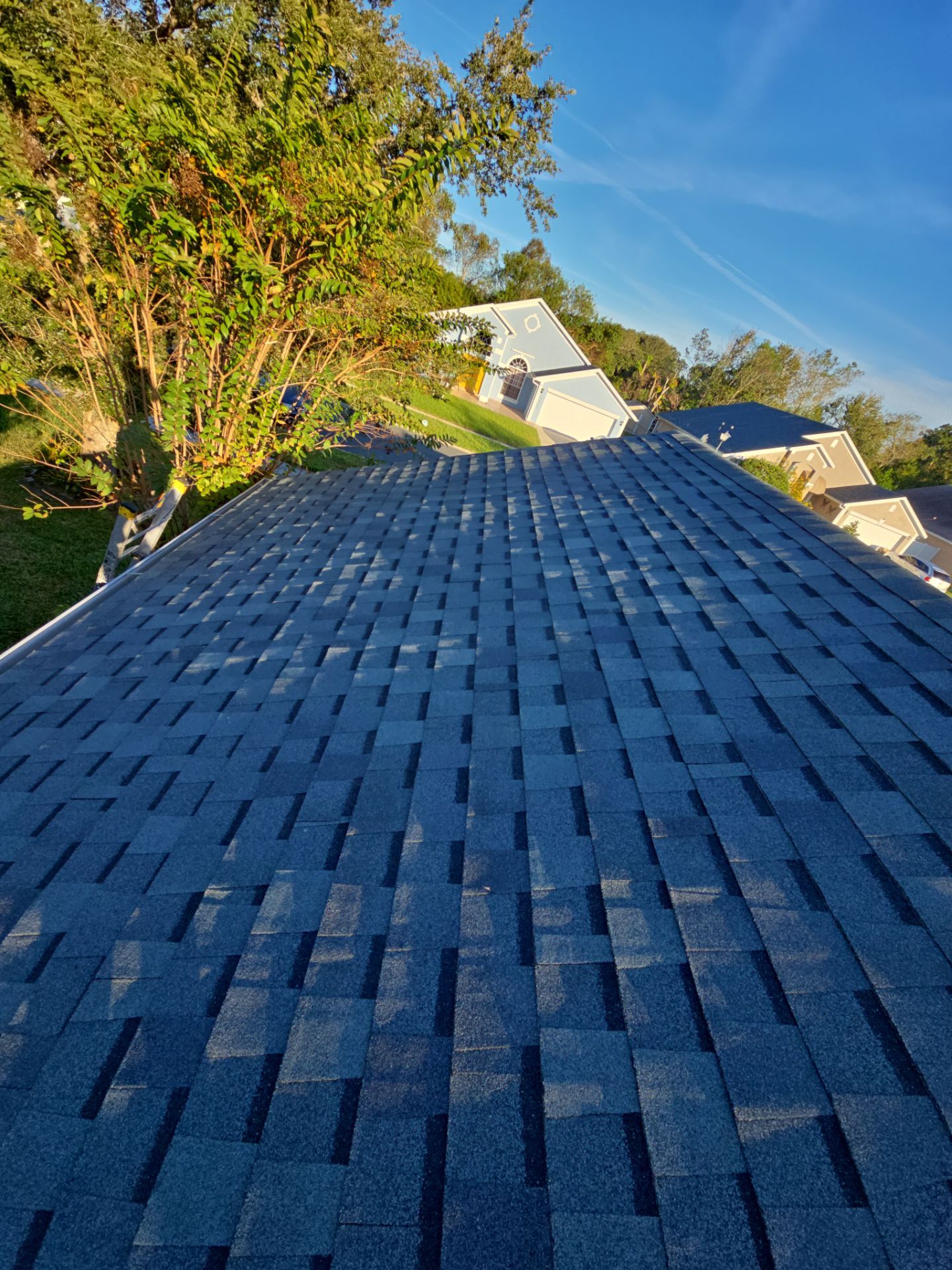 Atlas Pinnacle Pristine Architectural Shingle Roof Replacement in Kissimmee by Fortified Roofing Solutions Corp.