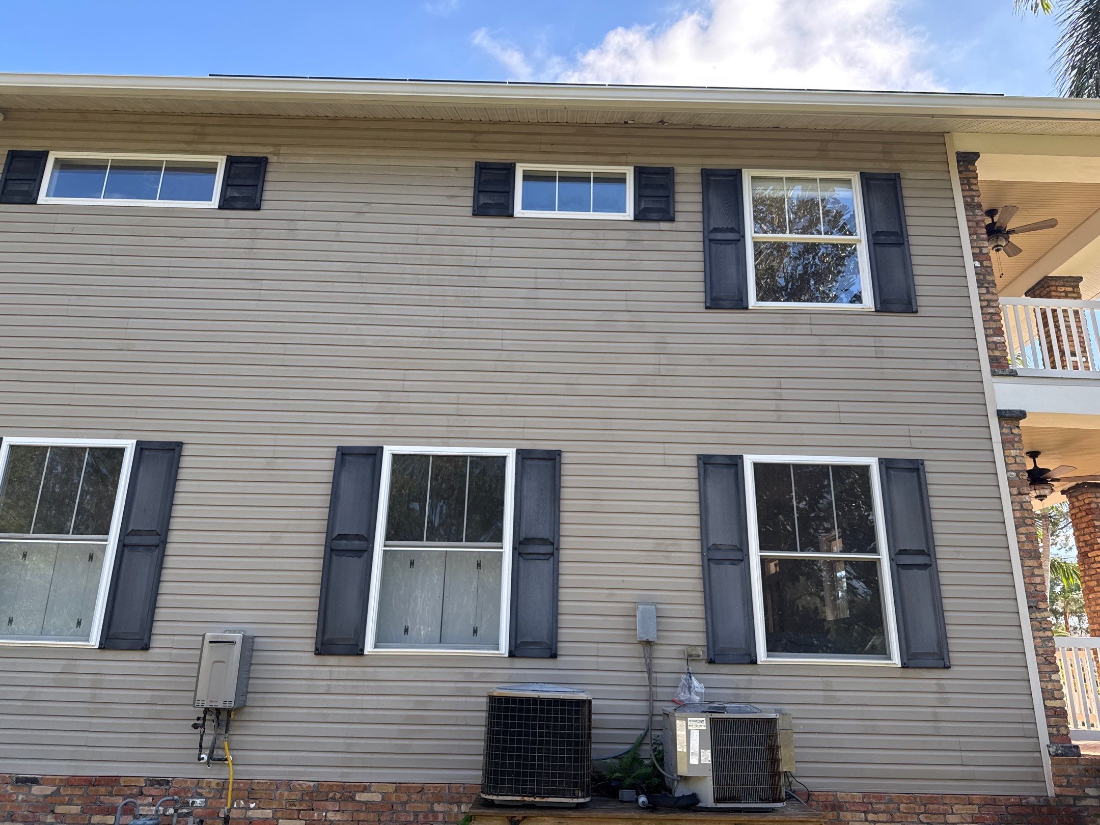 2-Story House Wash and Garage Pressure Washing in Palmetto, FL by Sunshine AquaWash