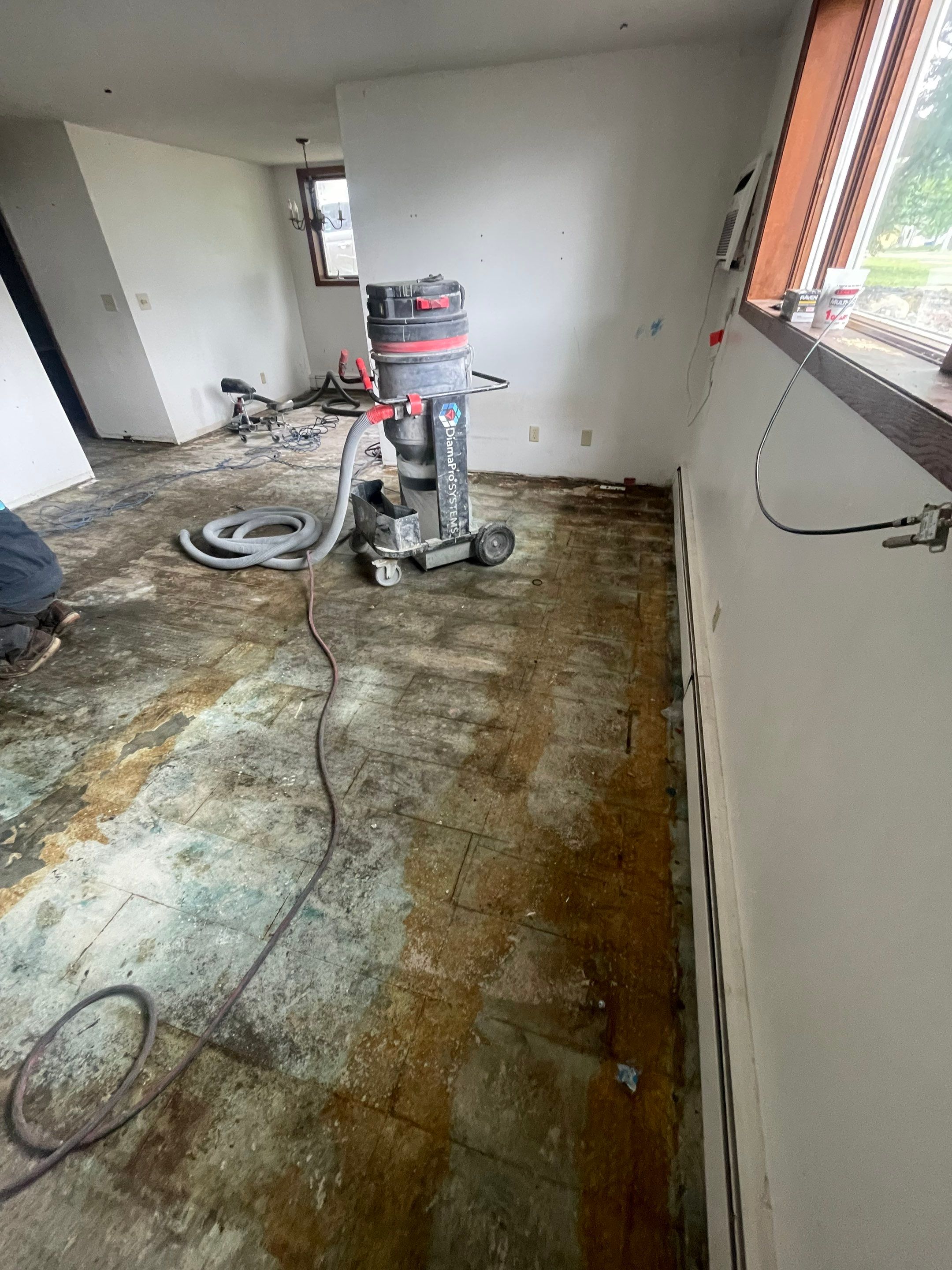 Commercial Subfloor Preparation and Flooring Restoration in Sioux Falls by Select Painting, Coatings & Garage Cabinets