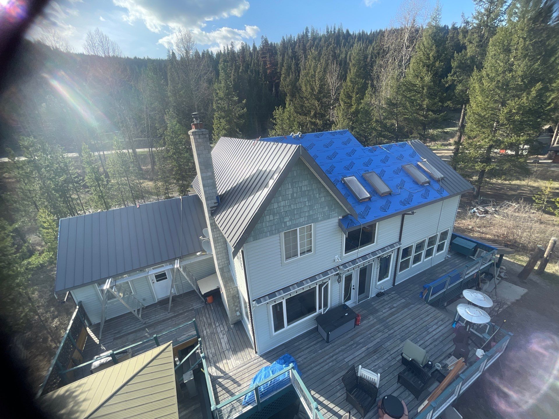 Shingle to Metal Roof Conversion by Top Notch Roofing Inc