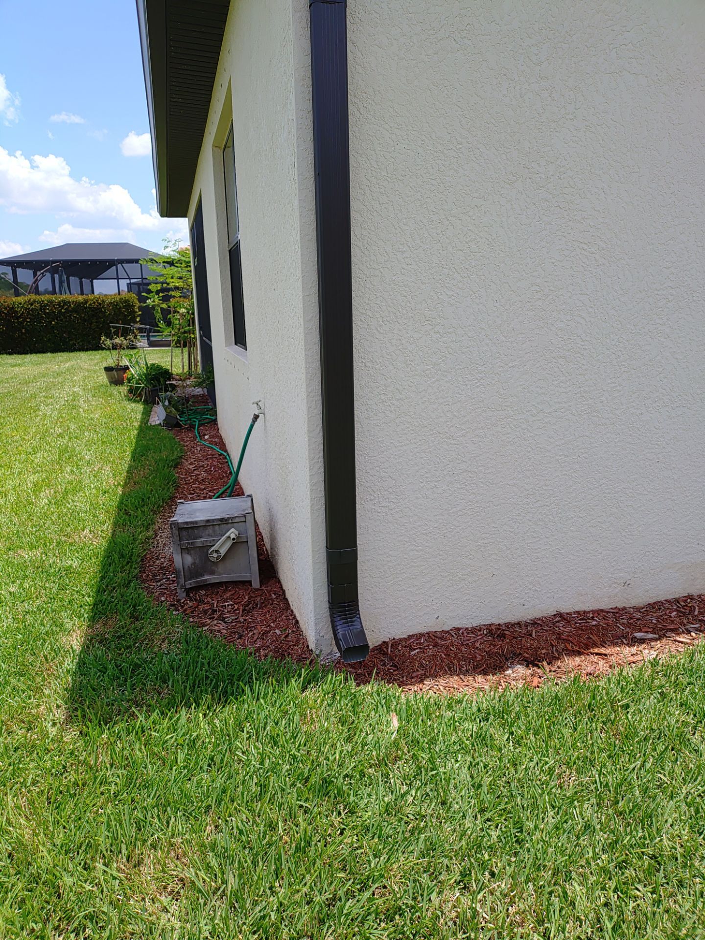Black 6-Inch Seamless Gutters in Fort Myers FL by Gutter Professor by Gutter Professors