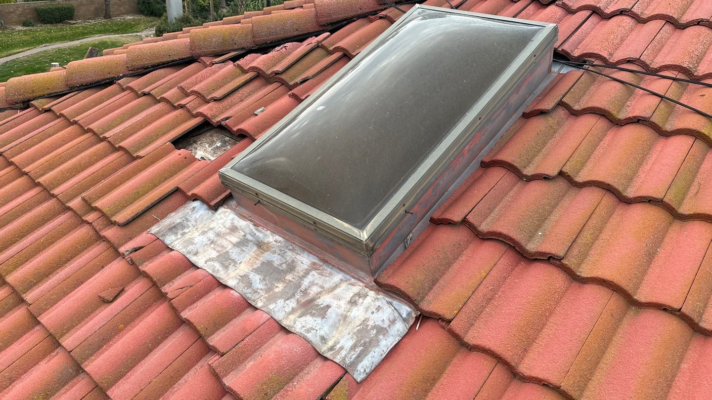 Tile refurbish project using existing tiles and replaced underlayment and battens by Straight Edge Roofing Inc